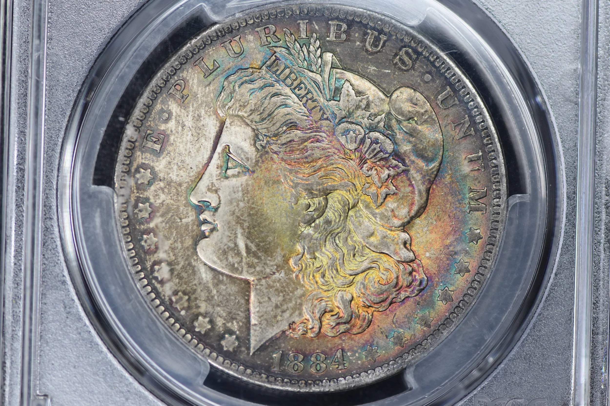1884 - O Morgan Silver Dollar PCGS MS65 Monster Toned
