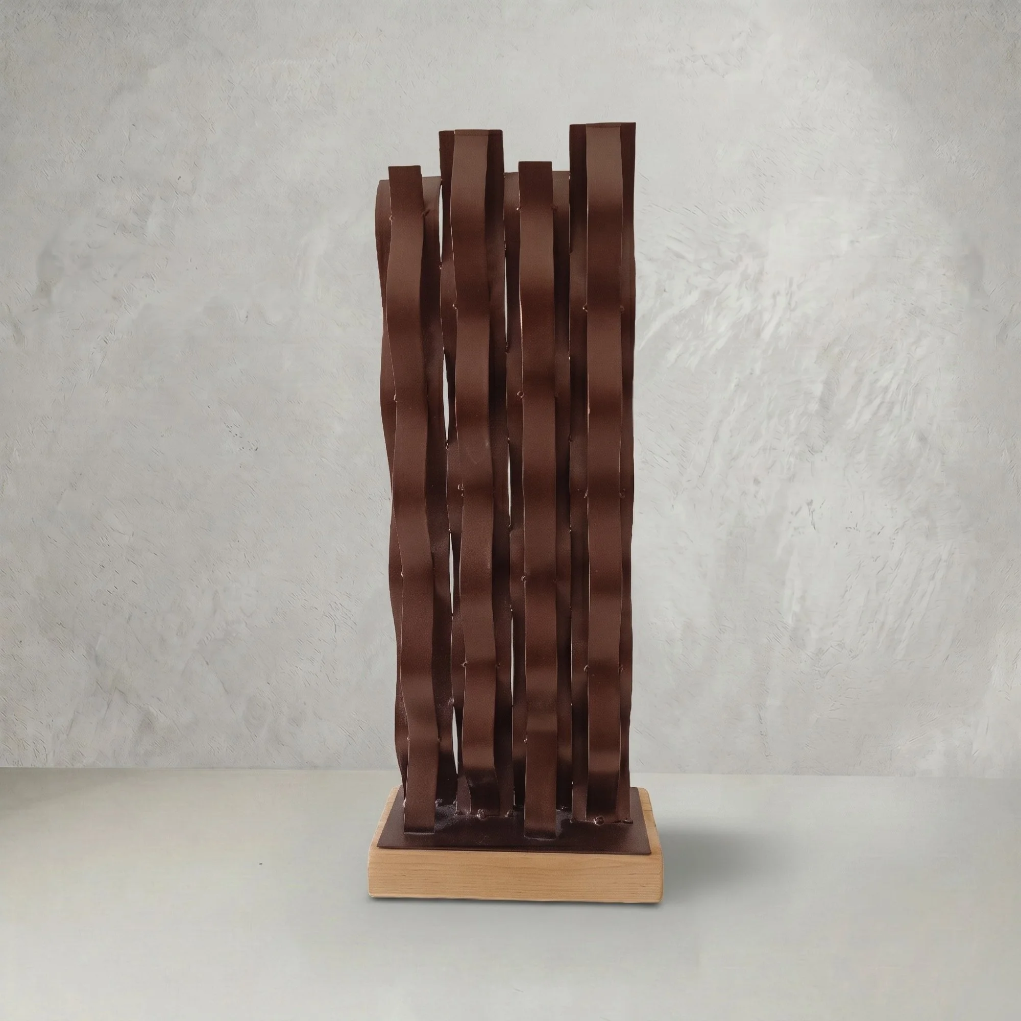 brown-wavy-metal-table-sculpture-wood-base.jpg