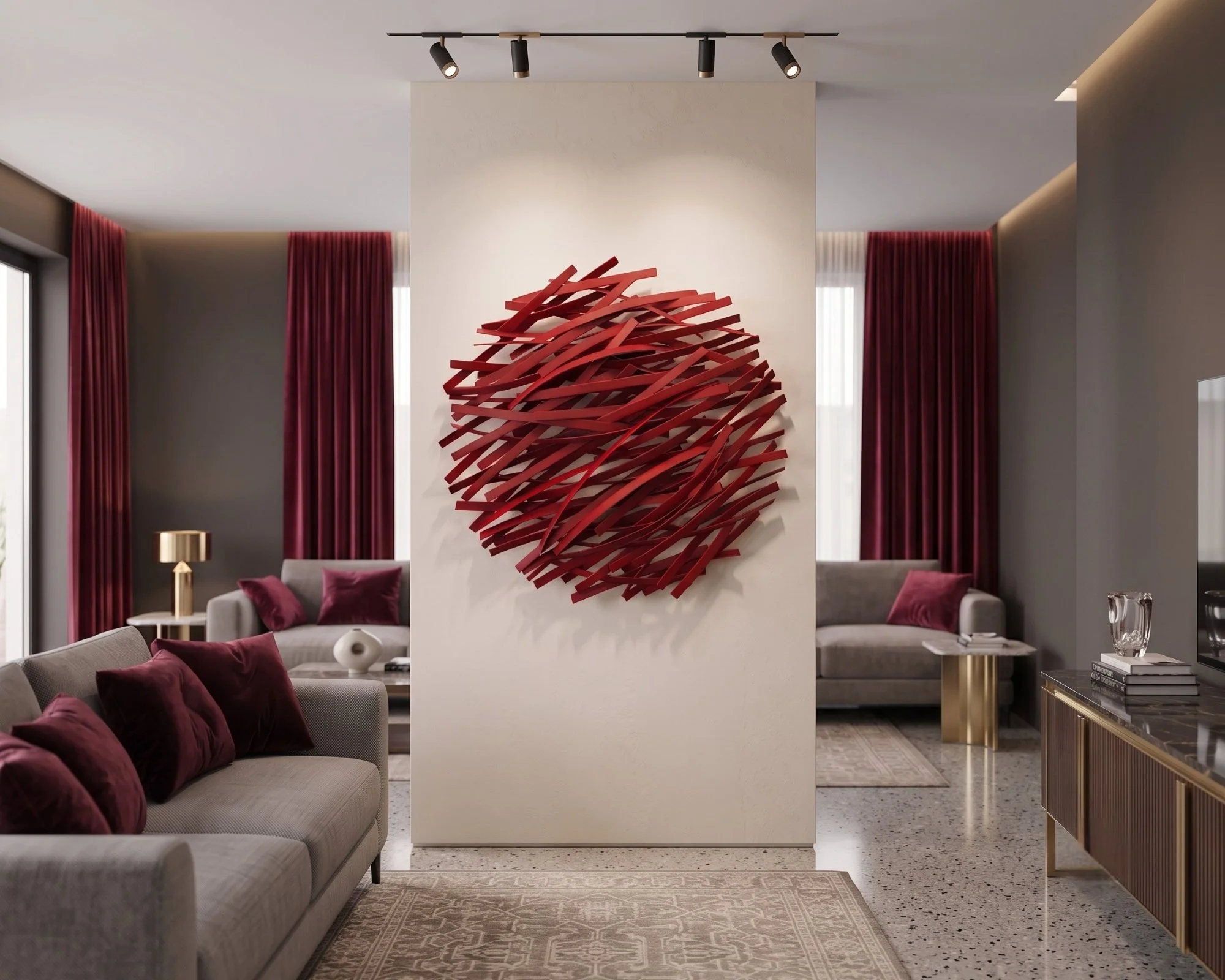 Red Circular Metal Wall Art, a 3D woven steel sculpture by IOANNIS, displayed on a modern living room partition.