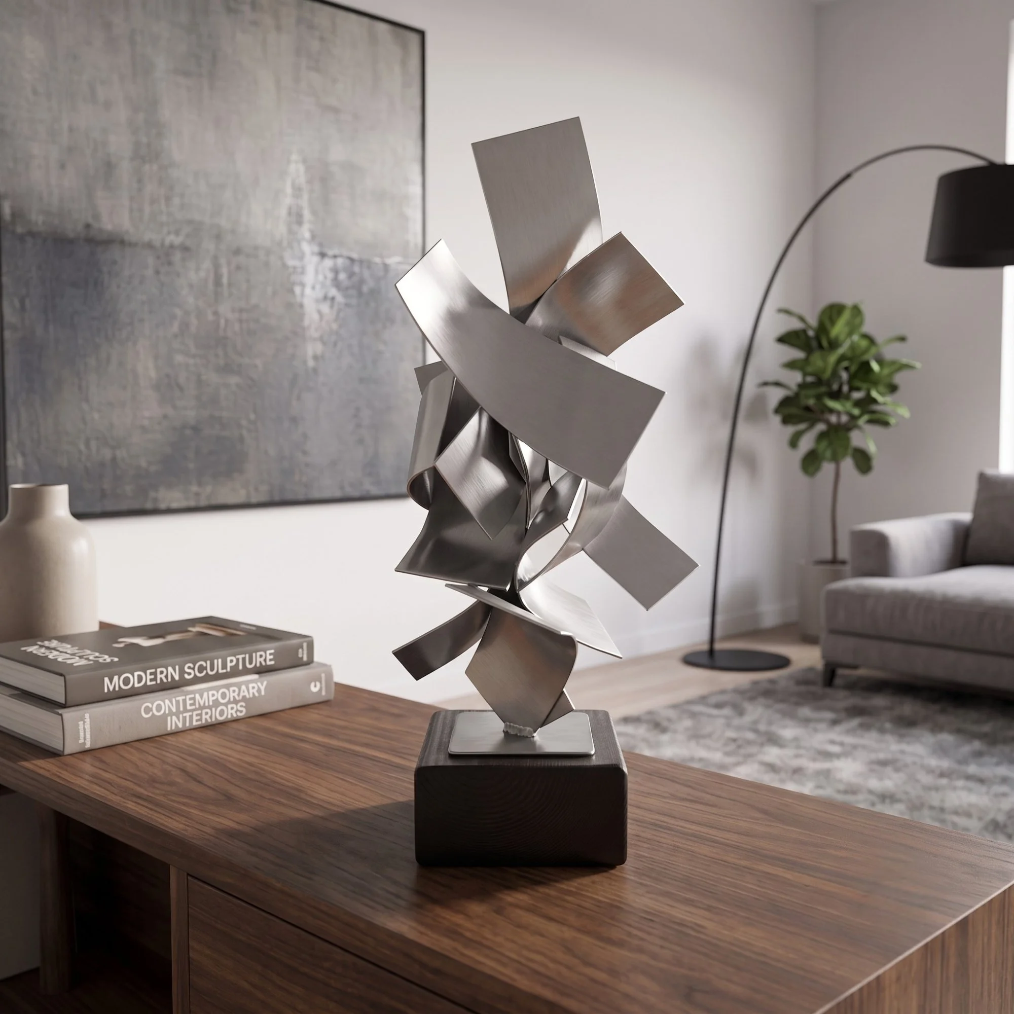 modern-brushed-steel-statue-desk-decor.jpg