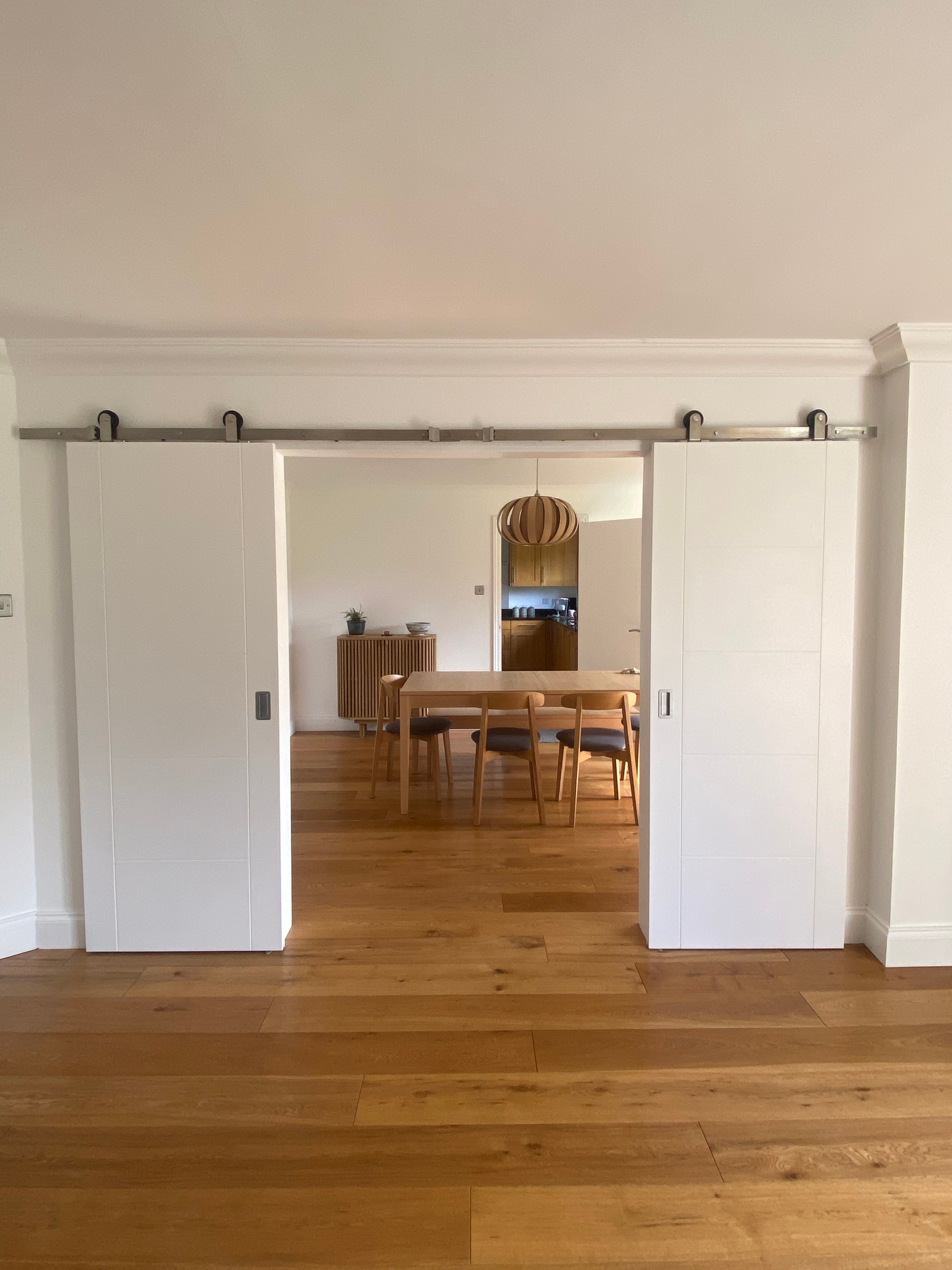 Bespoke white sliding doors