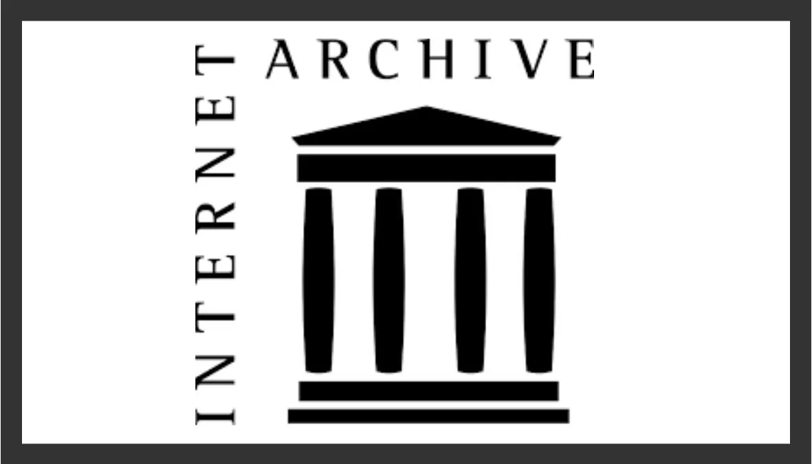 Logo of the International Archive with a stylized black Greek-style building with four columns and two horizontal lines, and the words 'INTERNATIONAL ARCHIVE' written vertically to the left of the building.