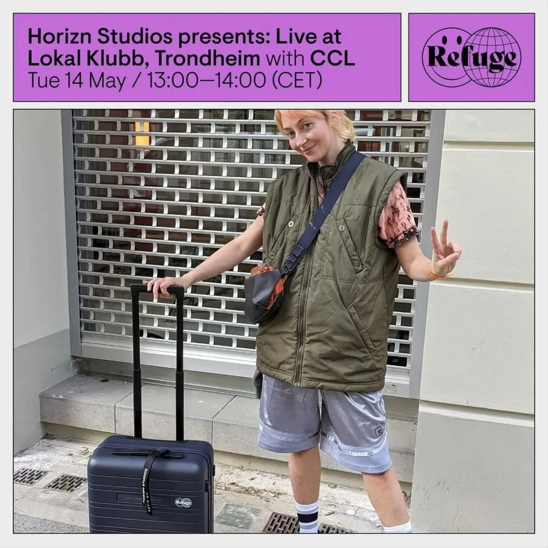 A person standing outside, holding a rolling suitcase with one hand and making a peace sign with the other hand. They are wearing a green vest, gray shorts, black and white socks, and have a crossbody bag. The background features a metal gate and a white wall. The image is part of a promotional graphic for a live event at Lokal Klubb, Trondheim, with the Refuge logo in the top right corner.