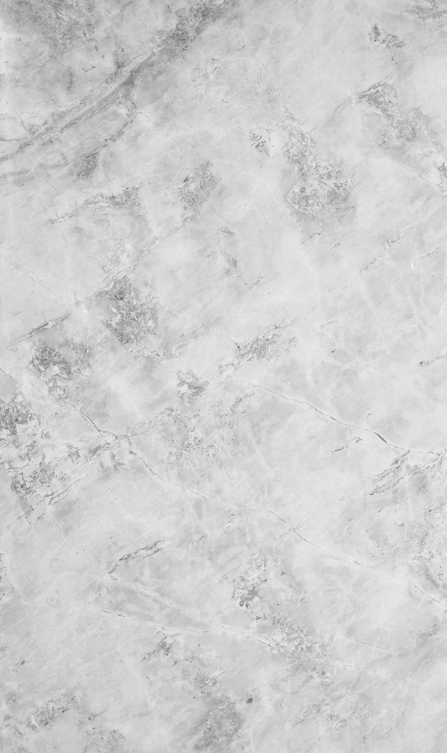 A gray marble floor with natural veining patterns.