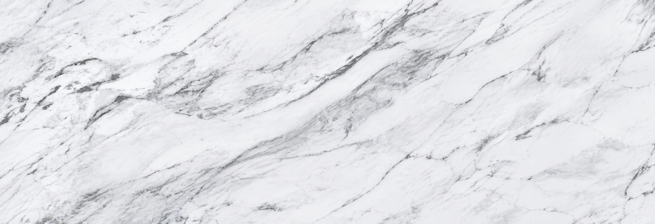 Marble surface with white and gray swirling patterns.