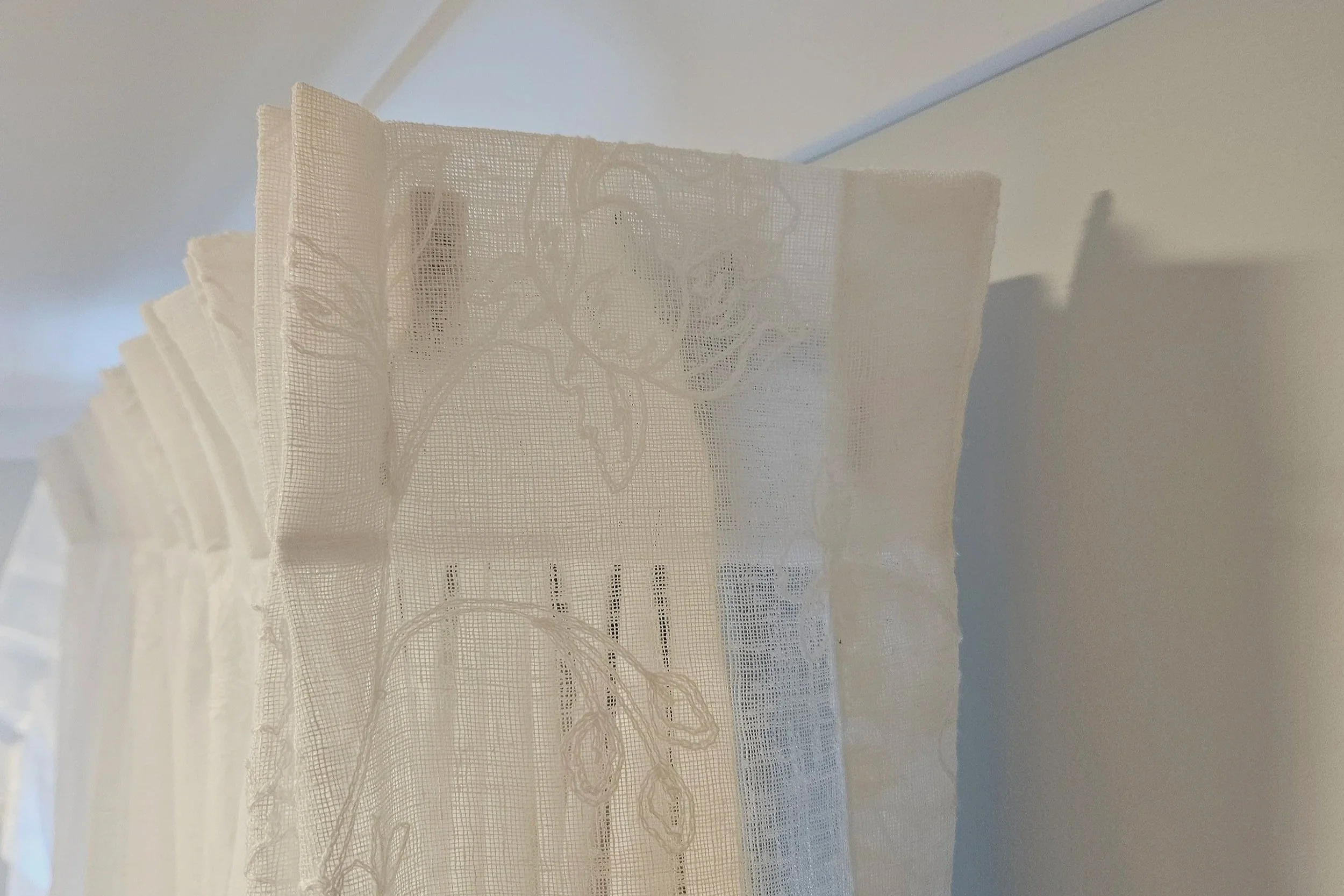 Pinch pleat curtains with returns