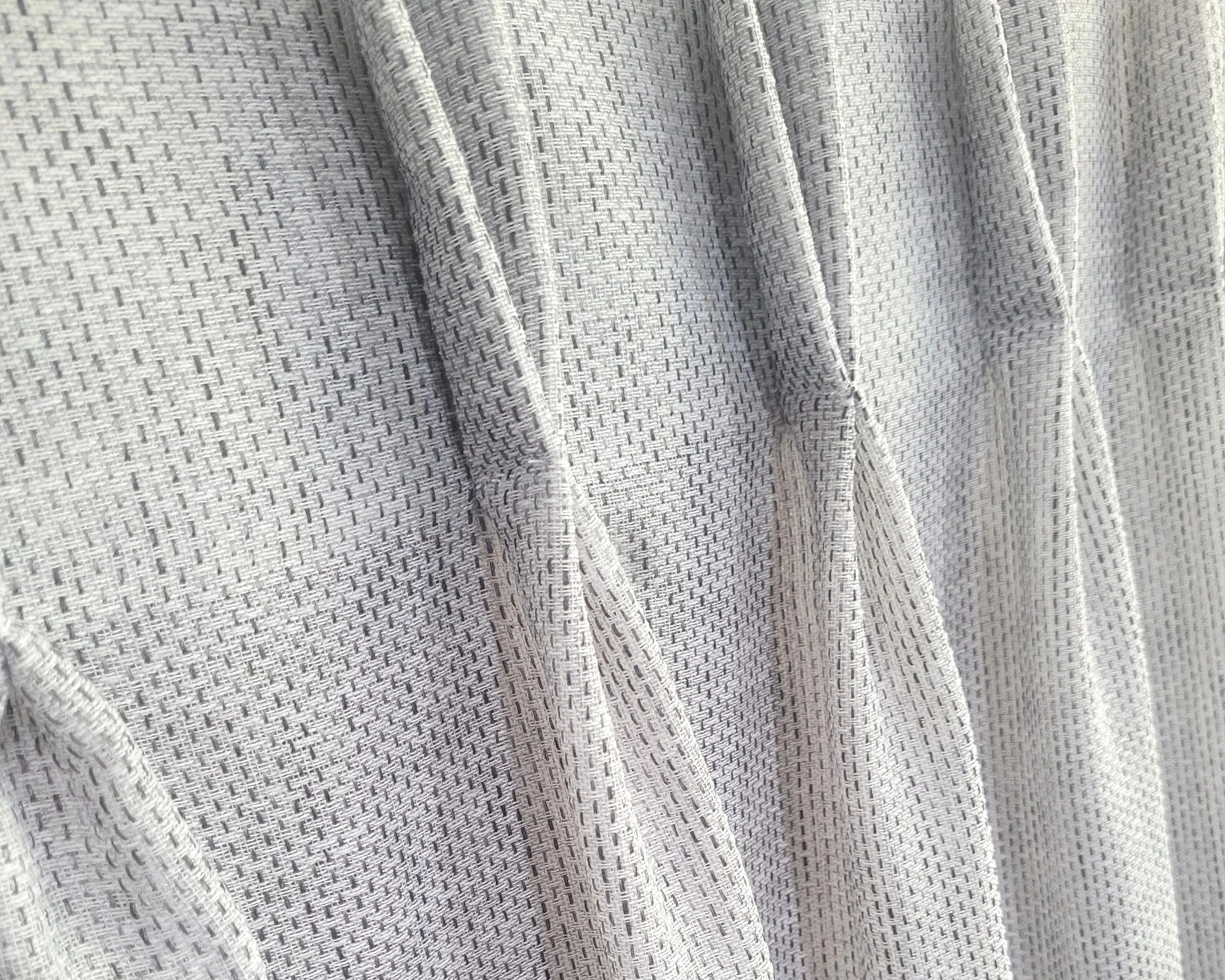 Double pinch pleat in sheer fabric