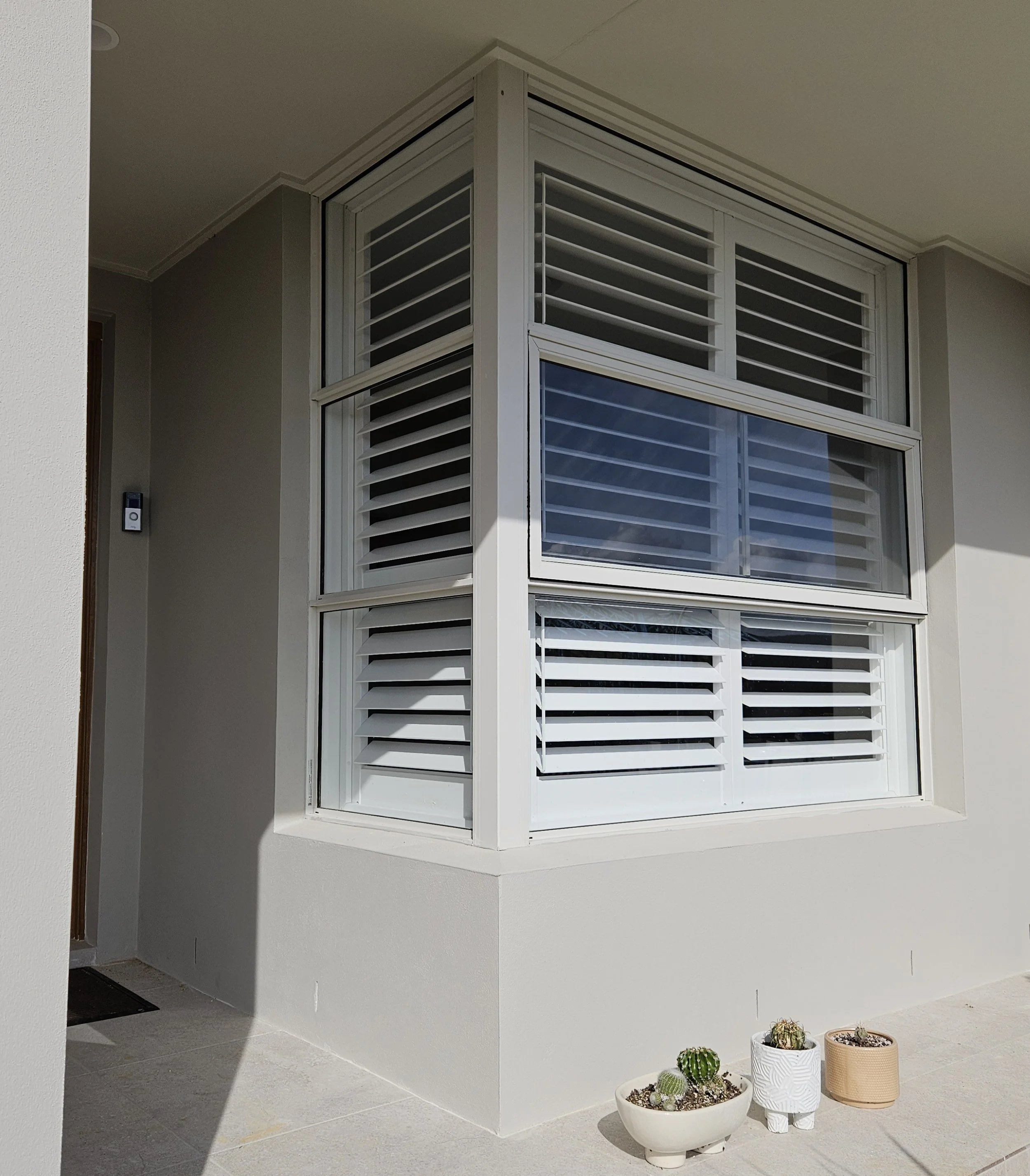 Emporium - internal corner shutters.jpg