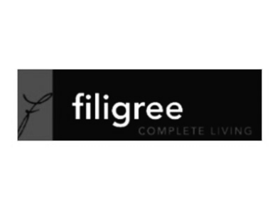 Filigree logo with the slogan 'Complete Living' on a black background.