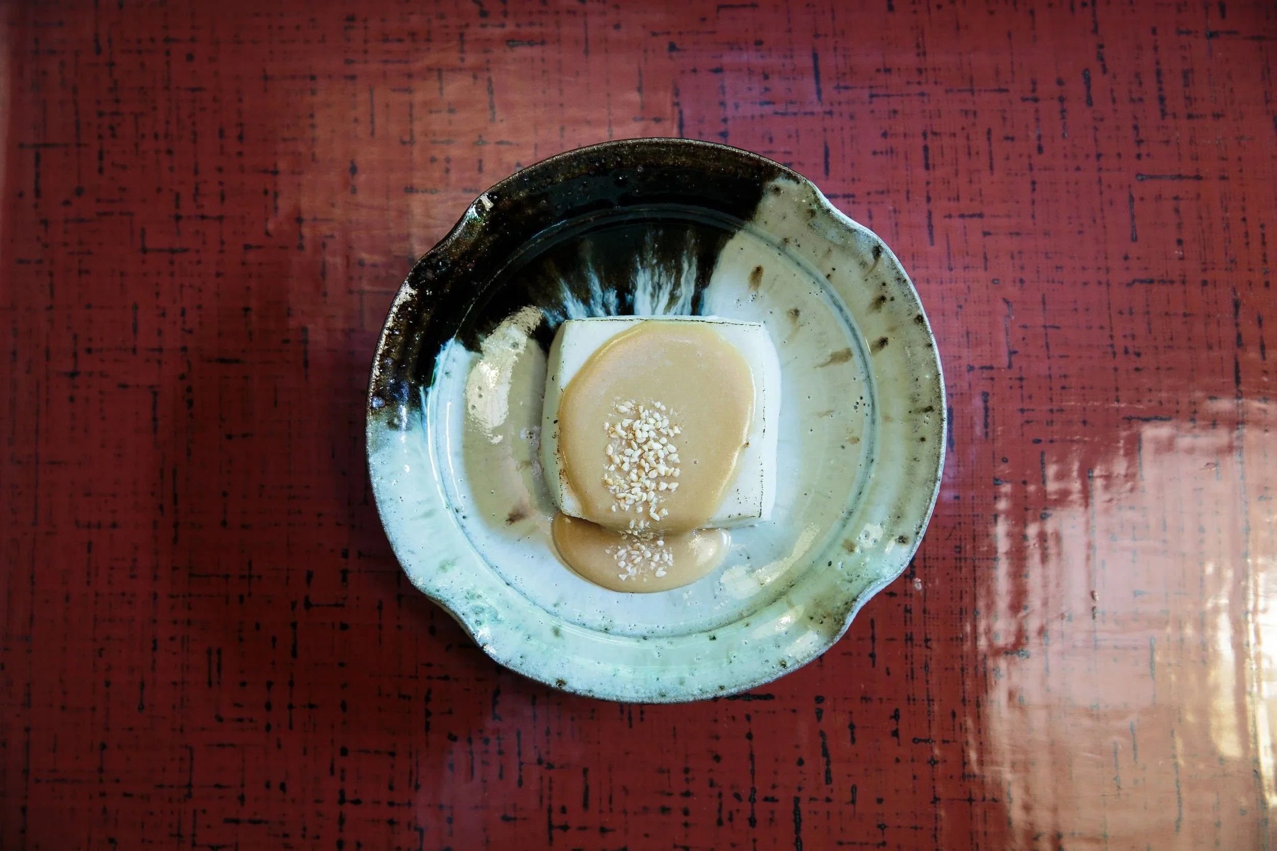 piece-tofu-topped-beige-sauce-sesame-tokyo-food-photographer.jpg