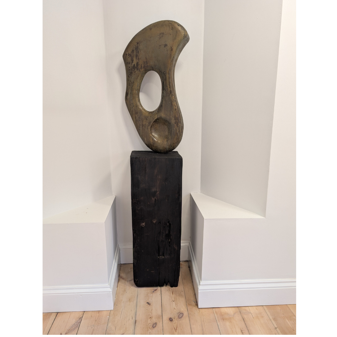 SHACKLES & BONES 176cm (H) X 33cm X 29cm direct bronze sculpture, base made using a reclaimed pillar from Newlyn harbour. 