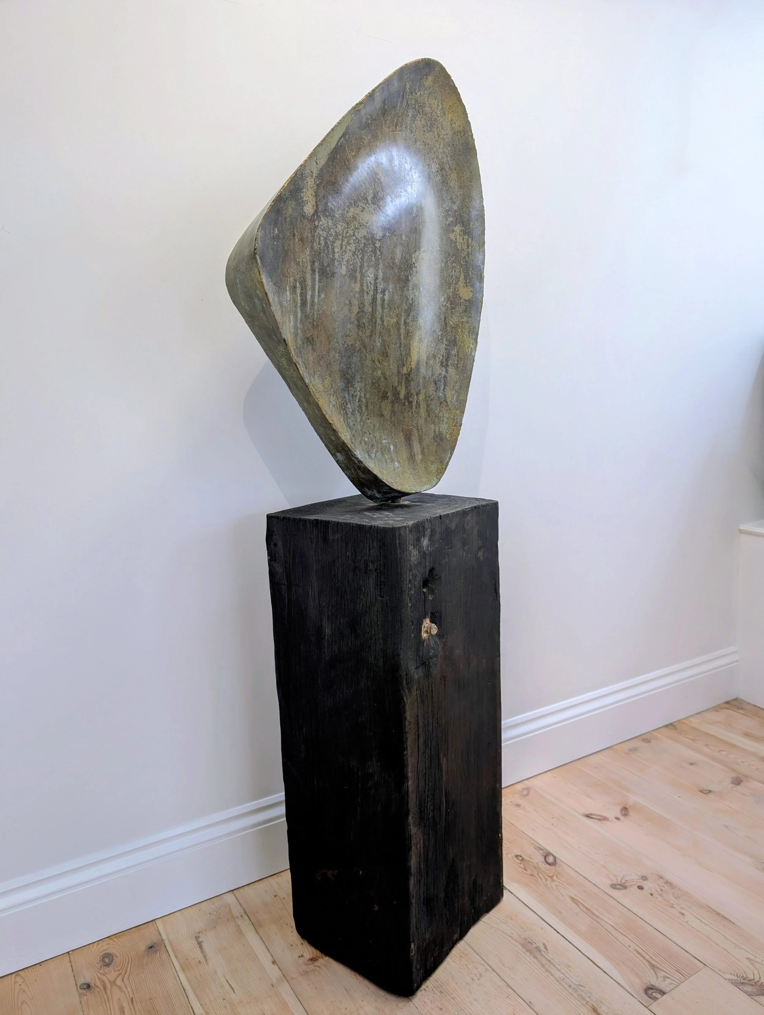 Eroded Rock Form 1159cm (H) x 51cm x 28cm direct bronze sculpture, base reclaimed pillar from Newlyn harbour