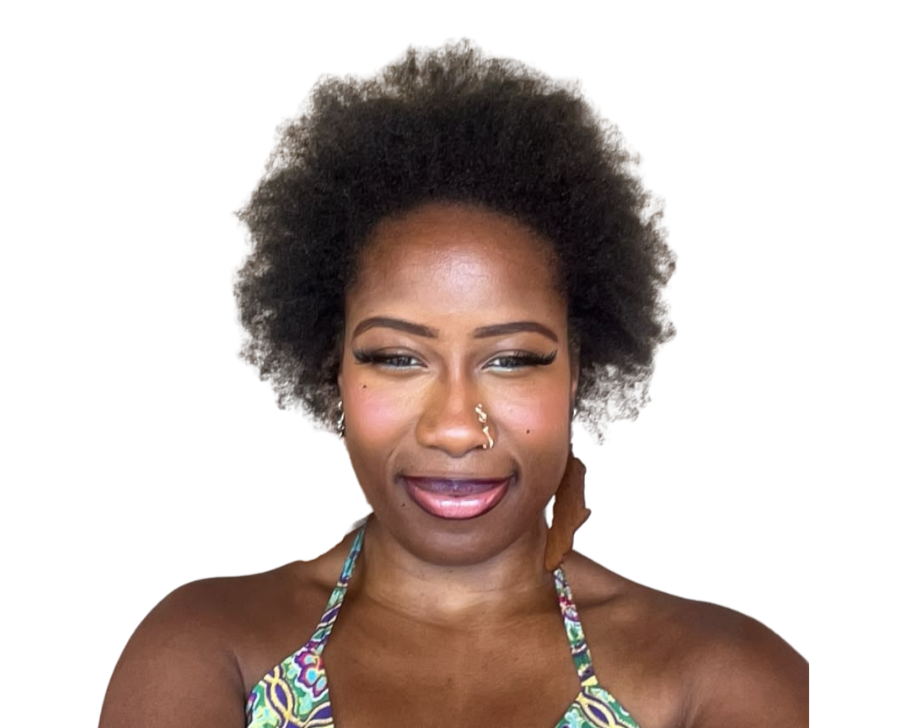 A woman with natural curly hair, wearing makeup and a multicolored patterned halter top, looking at the camera with a neutral expression against a white background.