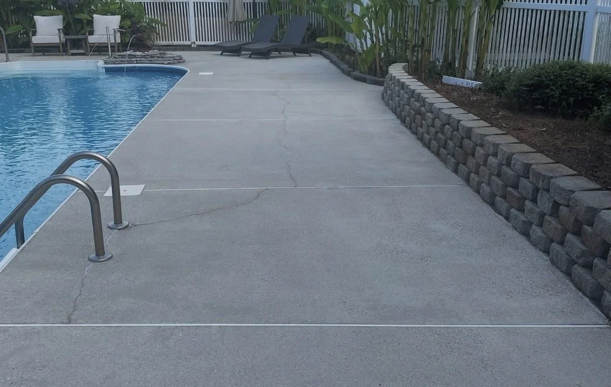 Clean conrcete is so much more inviting in this beautiful backyard.