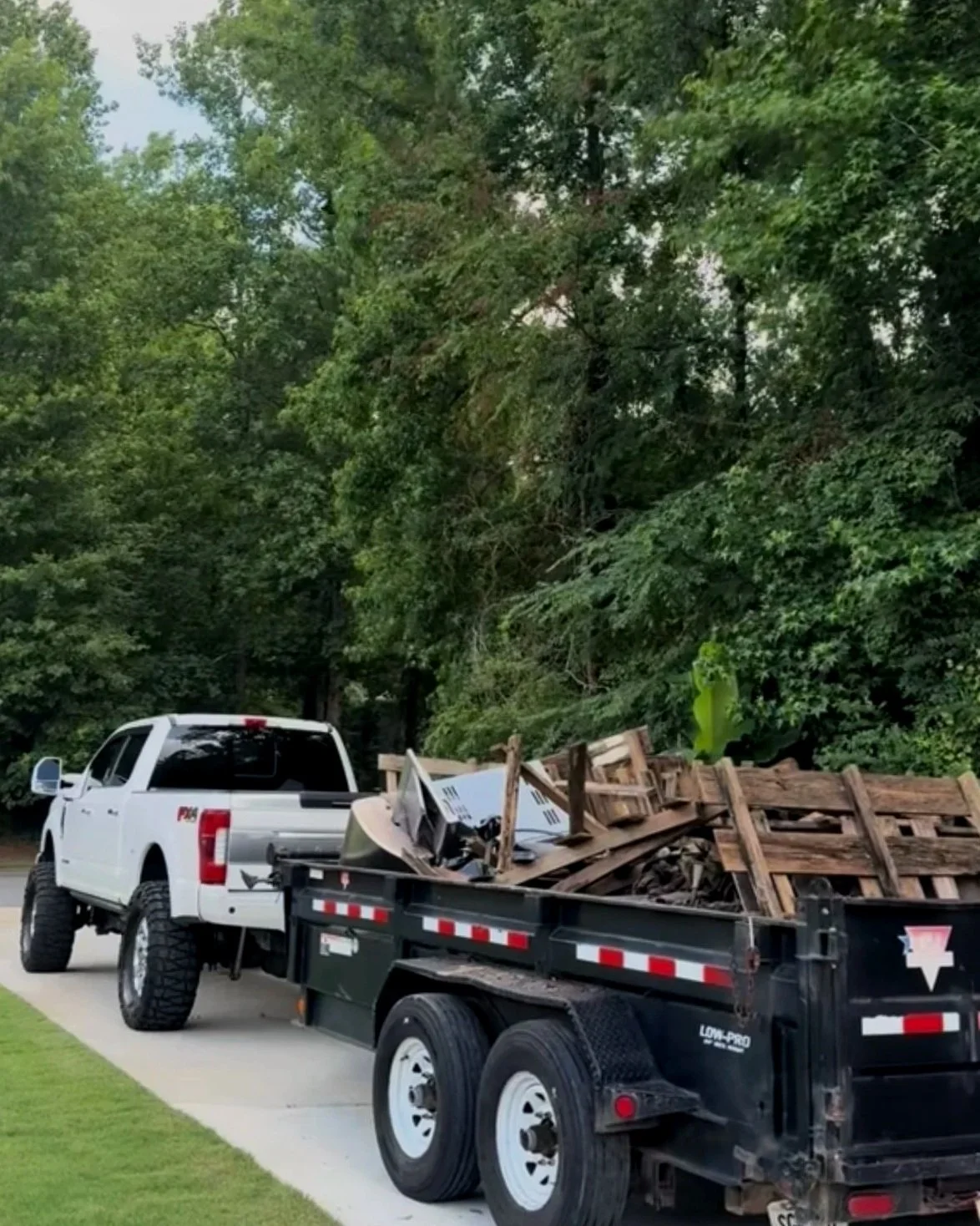 Dump trailer full of trash ready to haul away.
