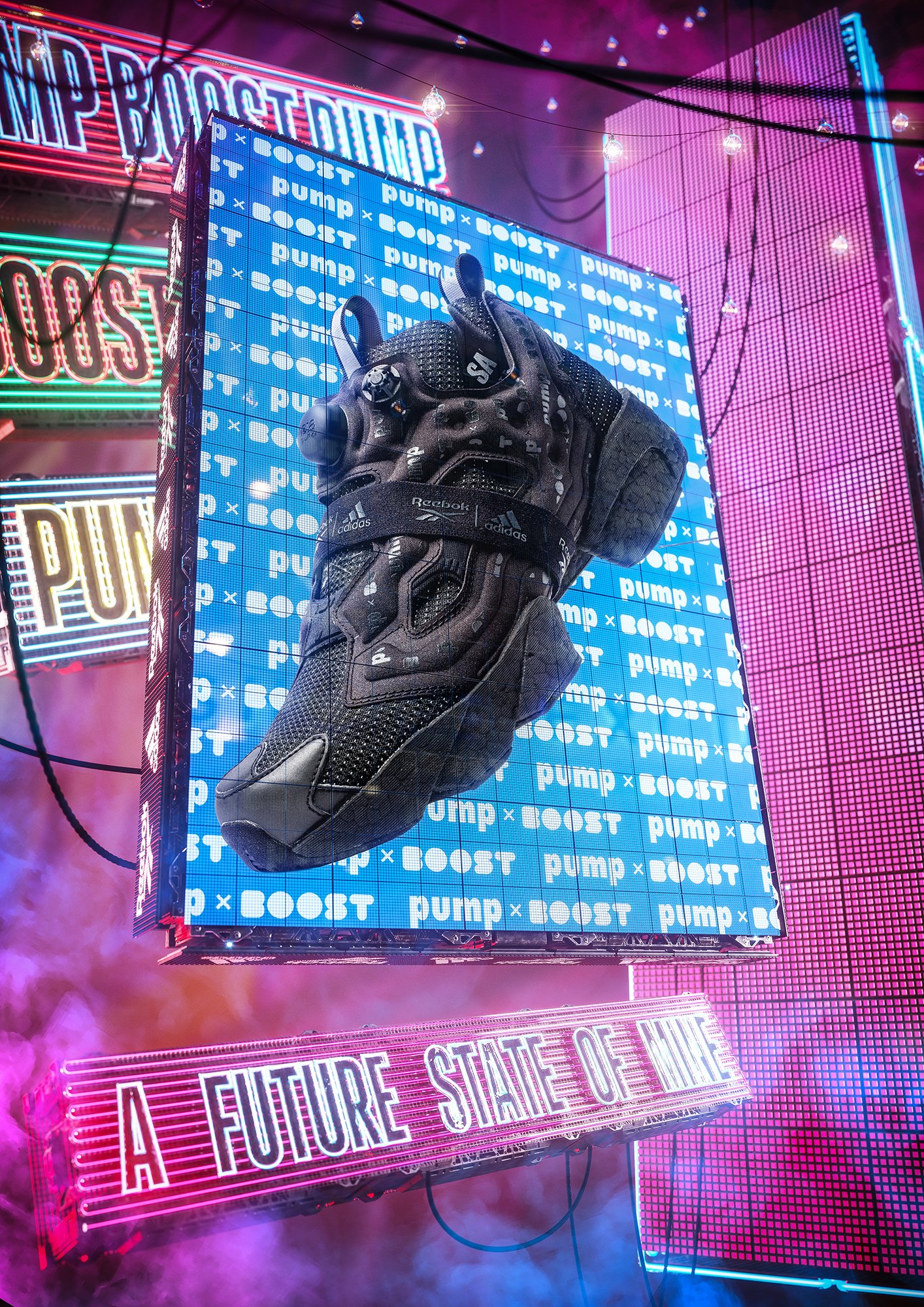 A single black athletic shoe with visible branding is displayed in front of a neon-lit digital display that repeats the words "pump" and "BOOST" on a blue background. Behind the display are various colorful neon signs with text, including "A FUTURE S