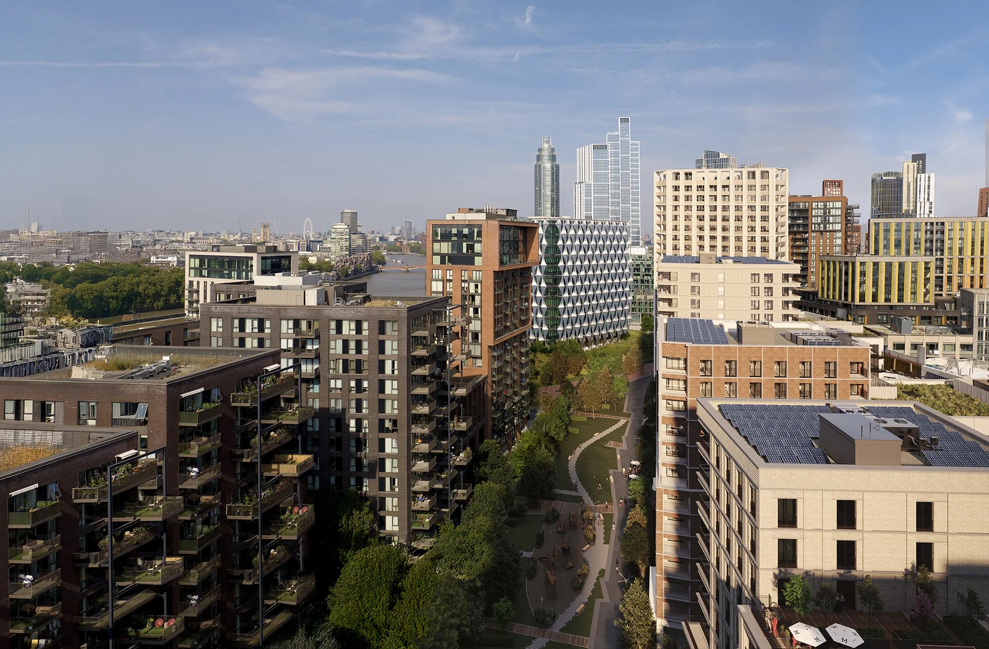A cityscape view with modern high-rise buildings along a river, with a park and pathways in the foreground and a blue sky with some clouds overhead.