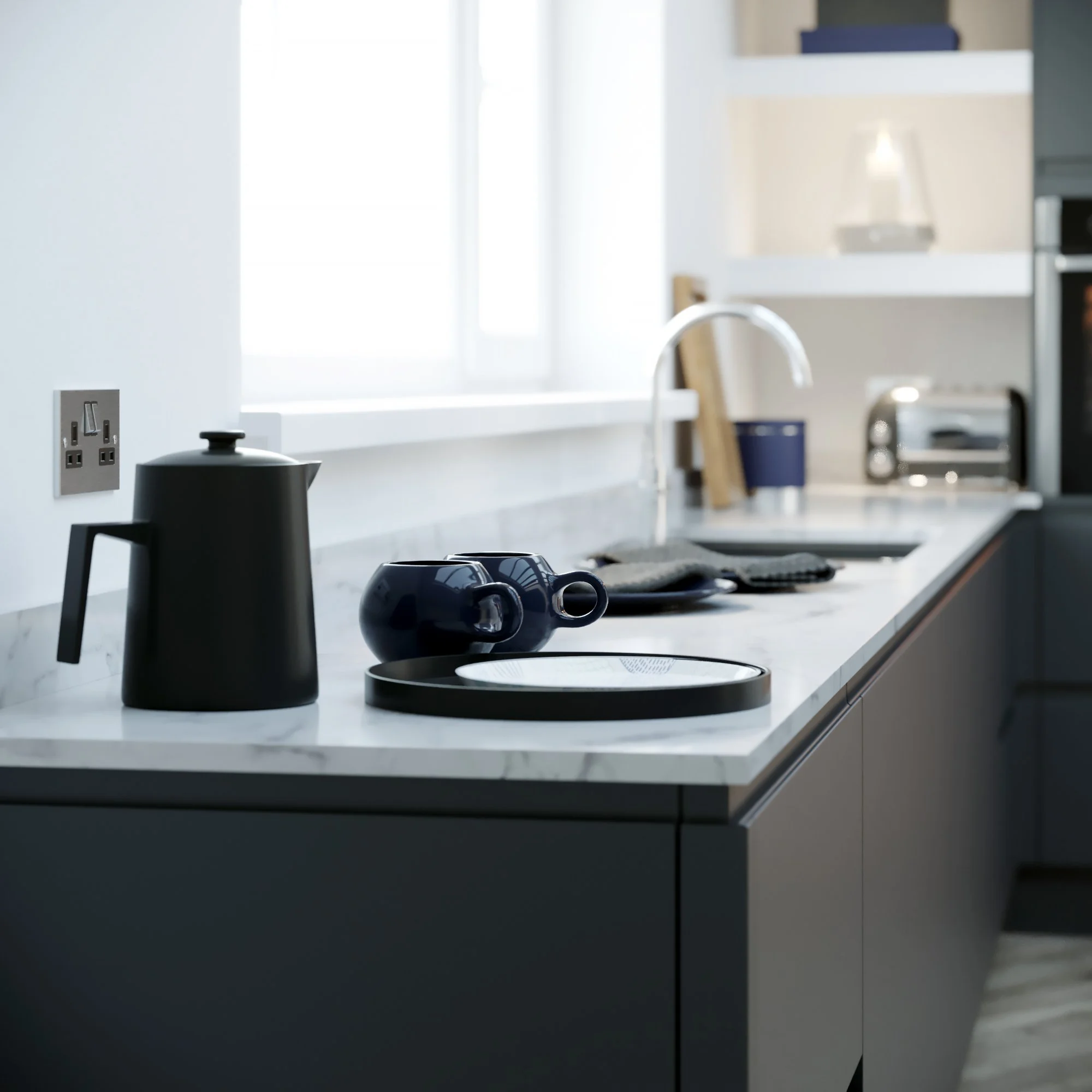 Modern kitchen with white countertop, black kettle, and blue mugs, with a window providing natural light.