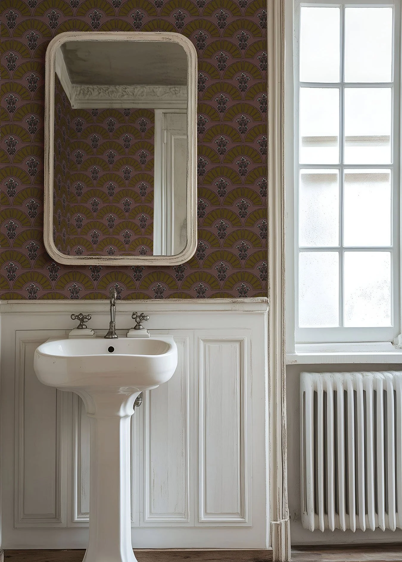 Bathroom with a brass schoolhouse sconce, vintage wood mirror, and beadboard wainscoting