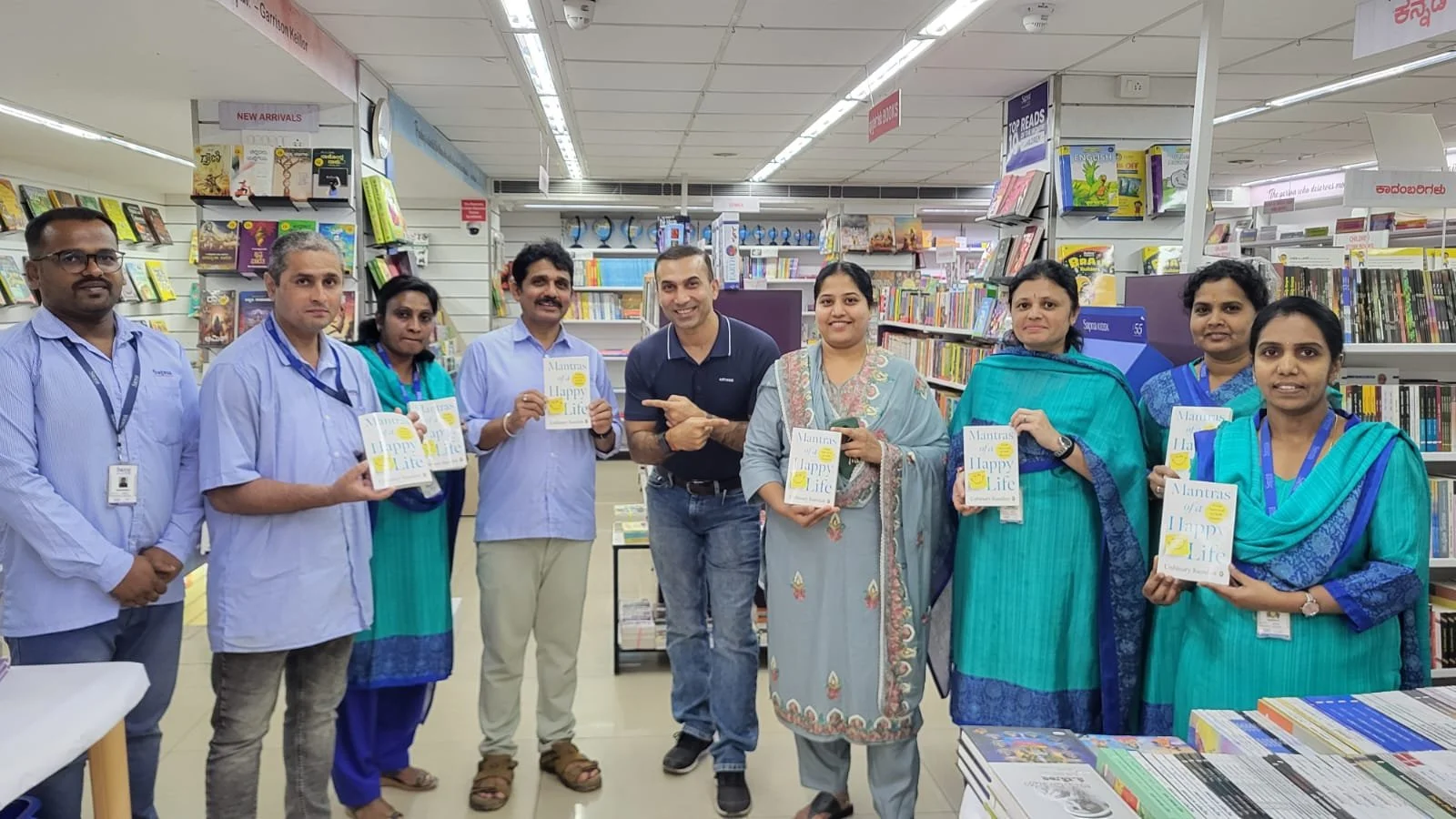 Kundan facilitating a book launch event at the book signing event in Bangalore. 