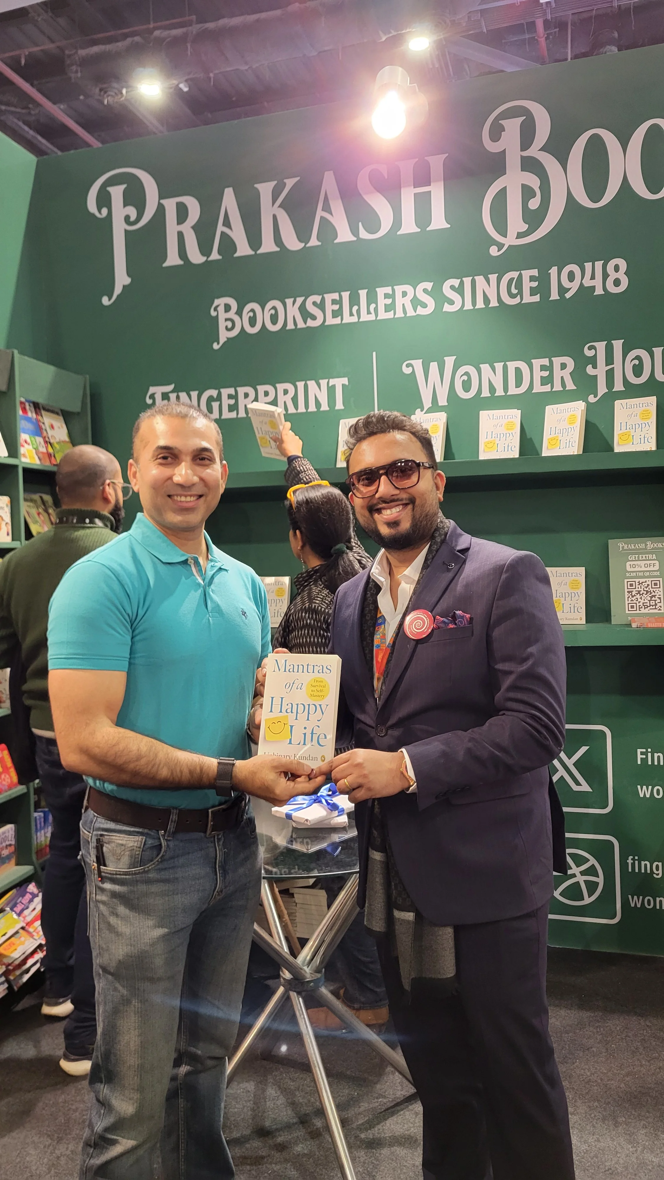 Kundan facilitating a book launch event at Book Fair, New Delhi