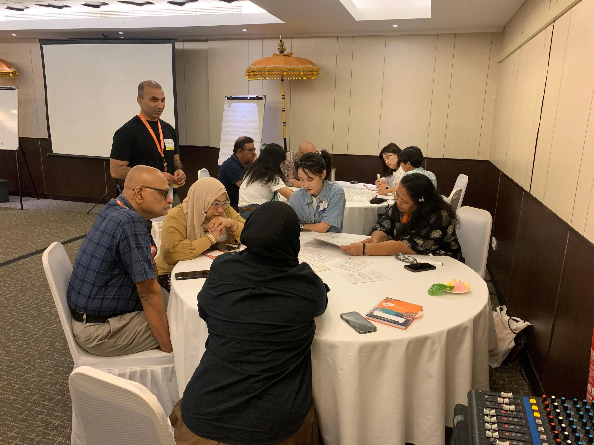 	
Kundan facilitating a small-group discussion with founders, New Delhi