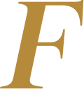 Close-up of a black background with a large, gold, stylized letter 'F' in the center.