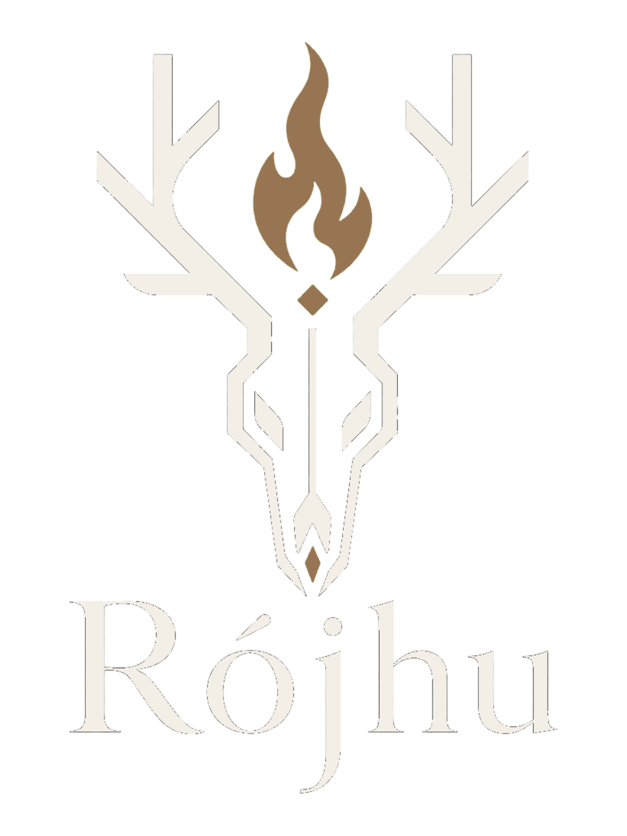 Stylized logo of a deer skull with antlers, with a flame-like element in the center of the forehead, and the word "Ròjhu" written below.