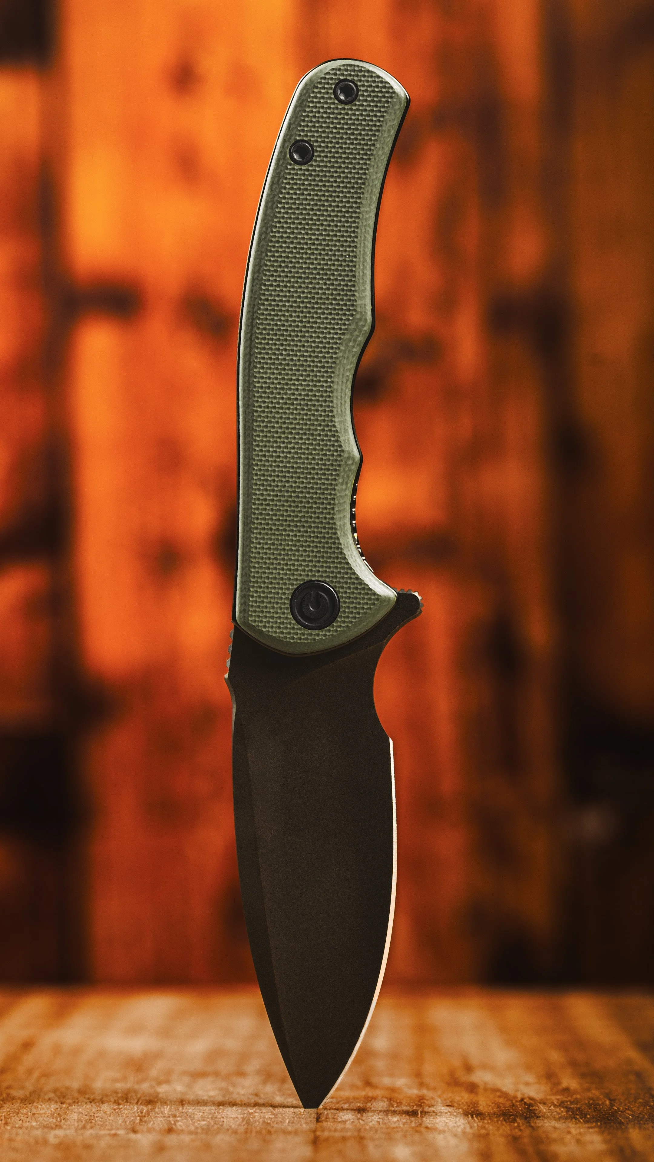 CIVIVI Green Knife Wood Background.jpg