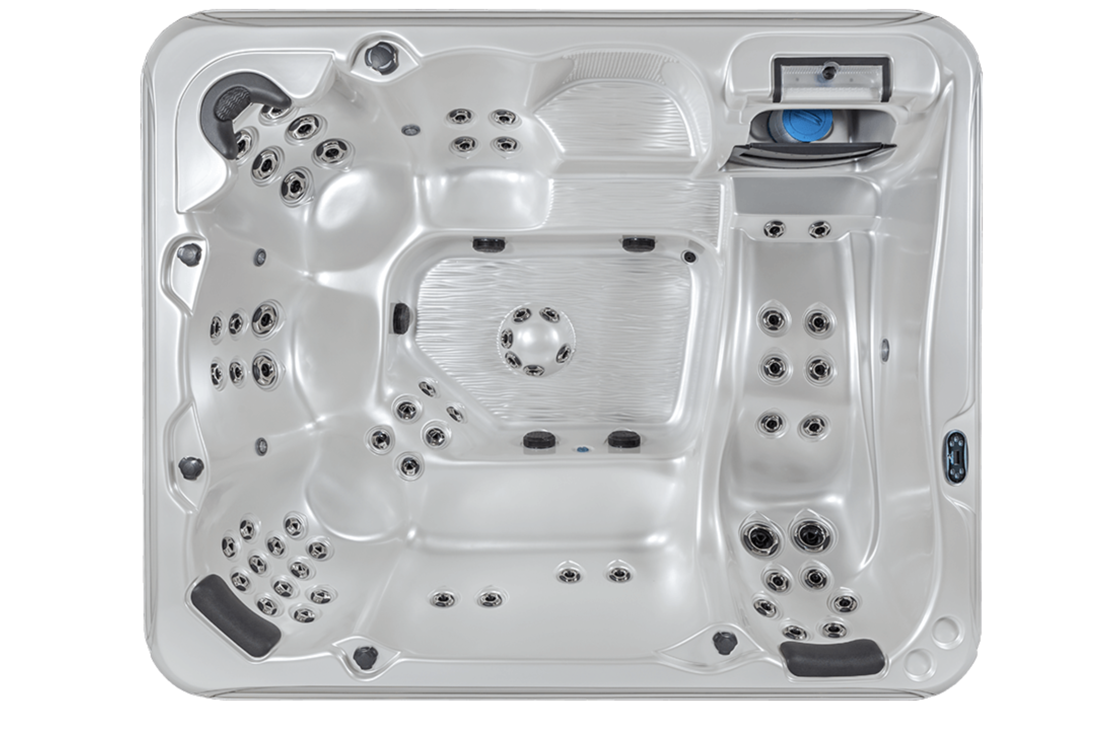 Top view of a white hot tub with multiple jets and a control panel.