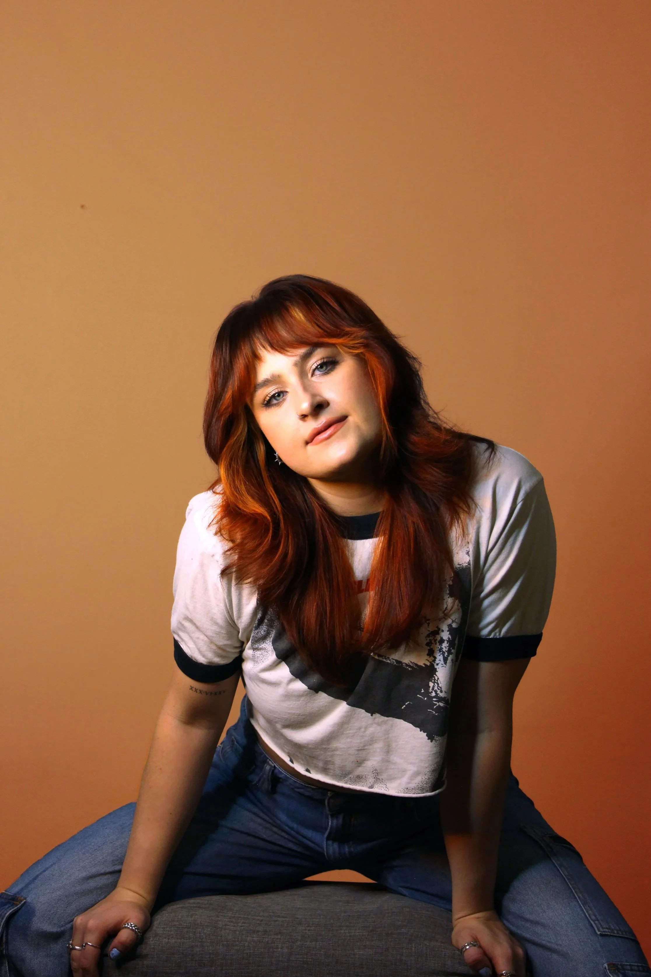 3-Sitting-T-Shirt-Orange-BG.jpg