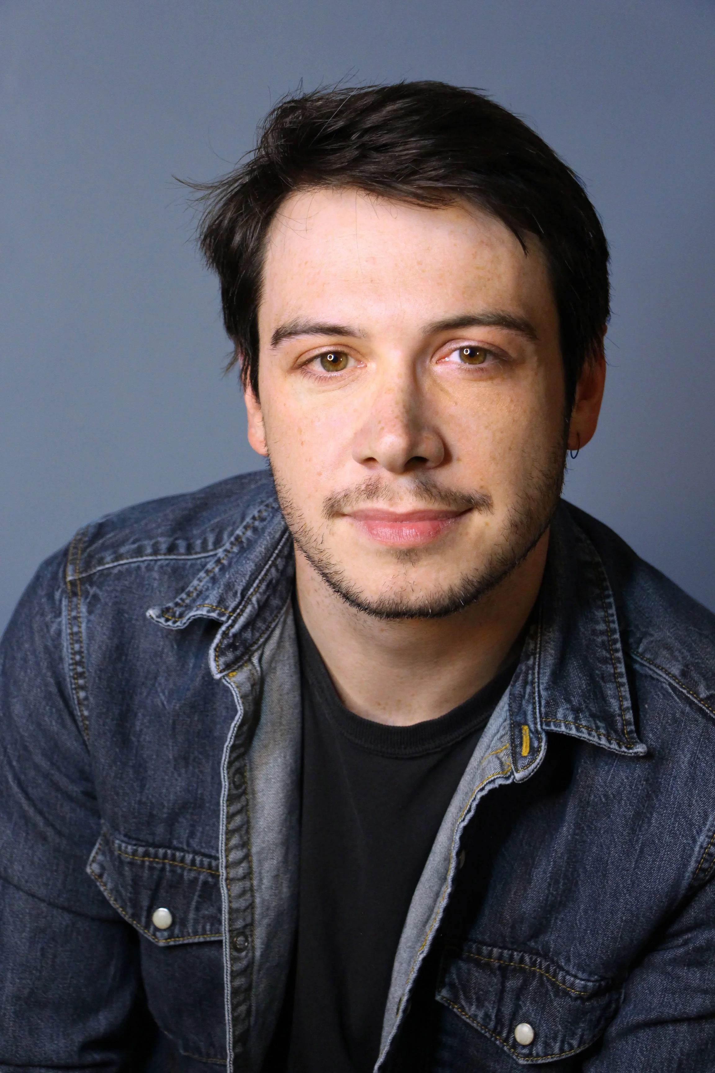 2-Sitting-JeanJacket-Blue-BG.jpg