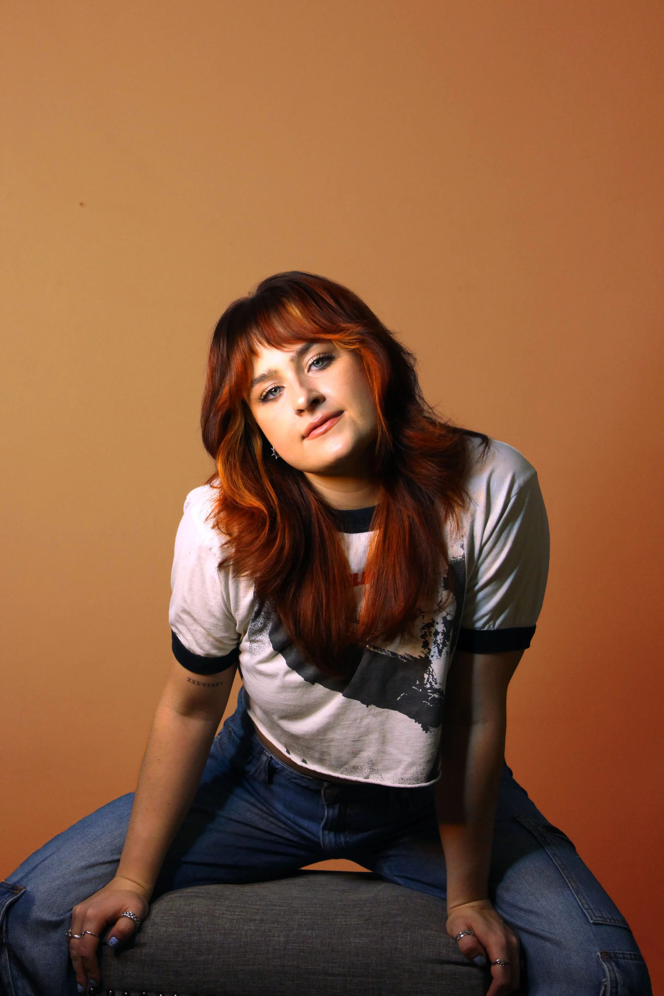 3-Sitting-T-Shirt-Orange-BG.jpg