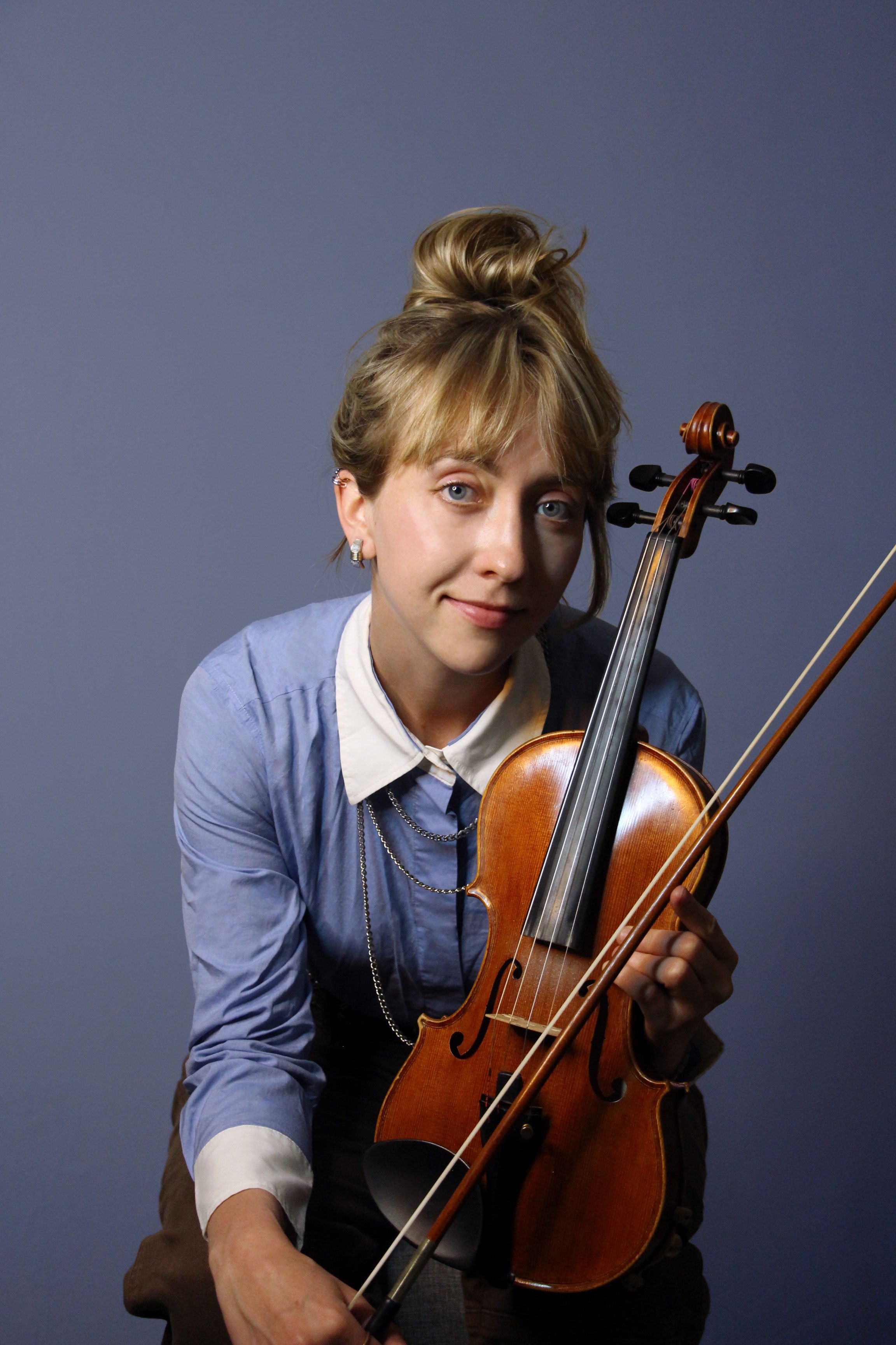 sittingviolinblueBG.jpg