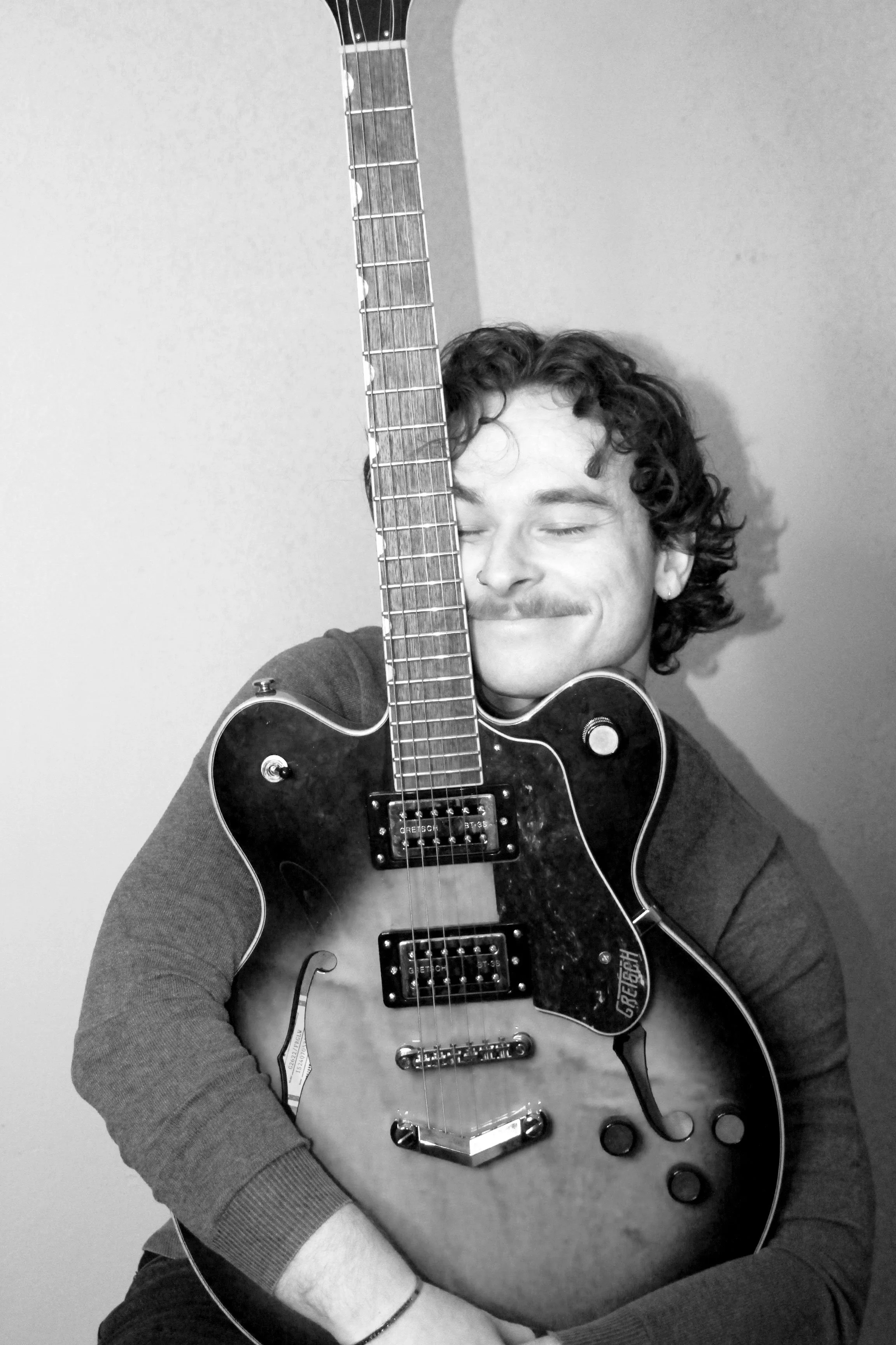 FINALbwsmileguitar.jpg