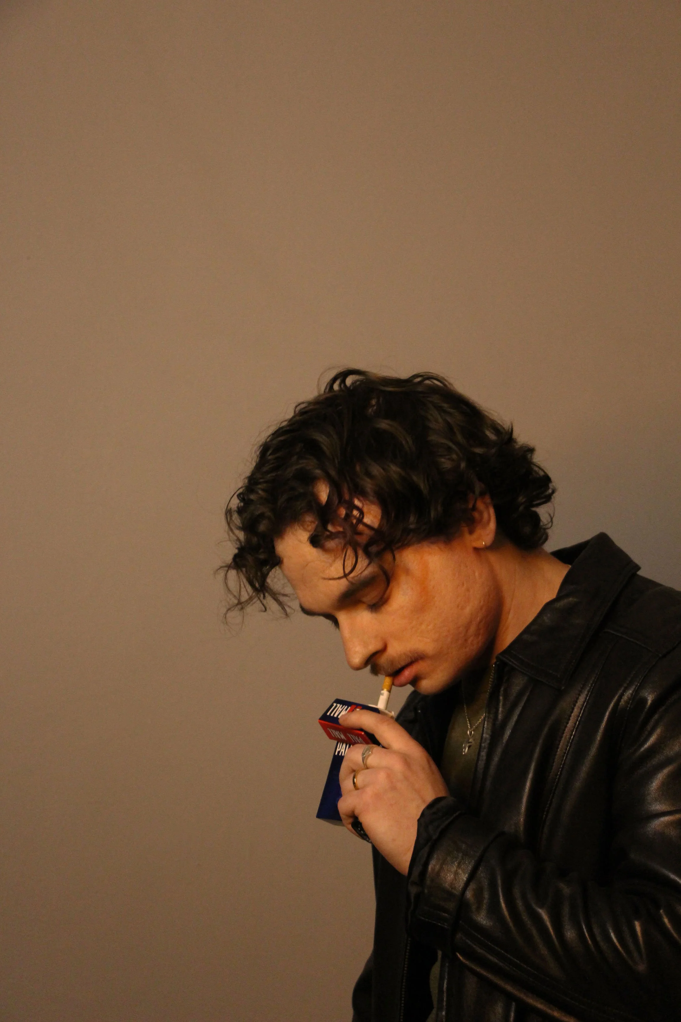slaysmokinglookingdownzac.jpg