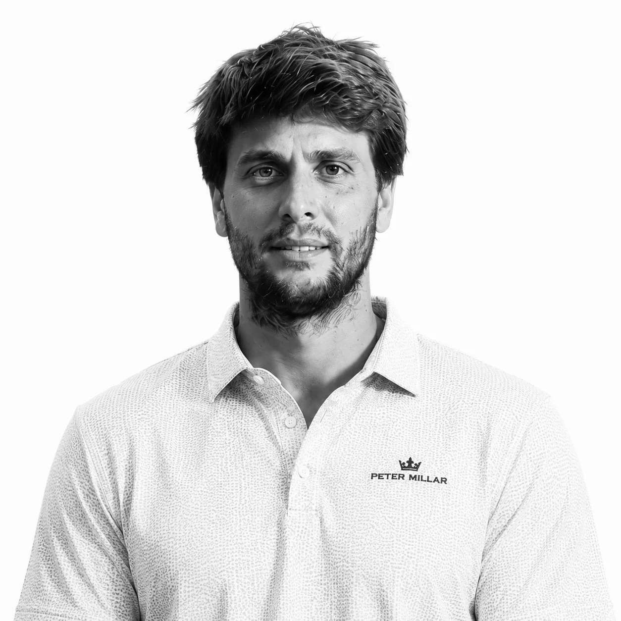 Filiberto, Rêverie Golf team member with a beard wearing a white Peter Millar polo shirt, portrait on a white background