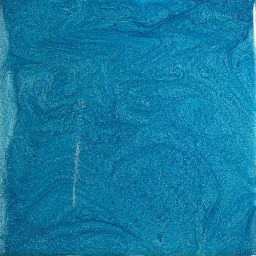 close up of a metallic epoxy pigment