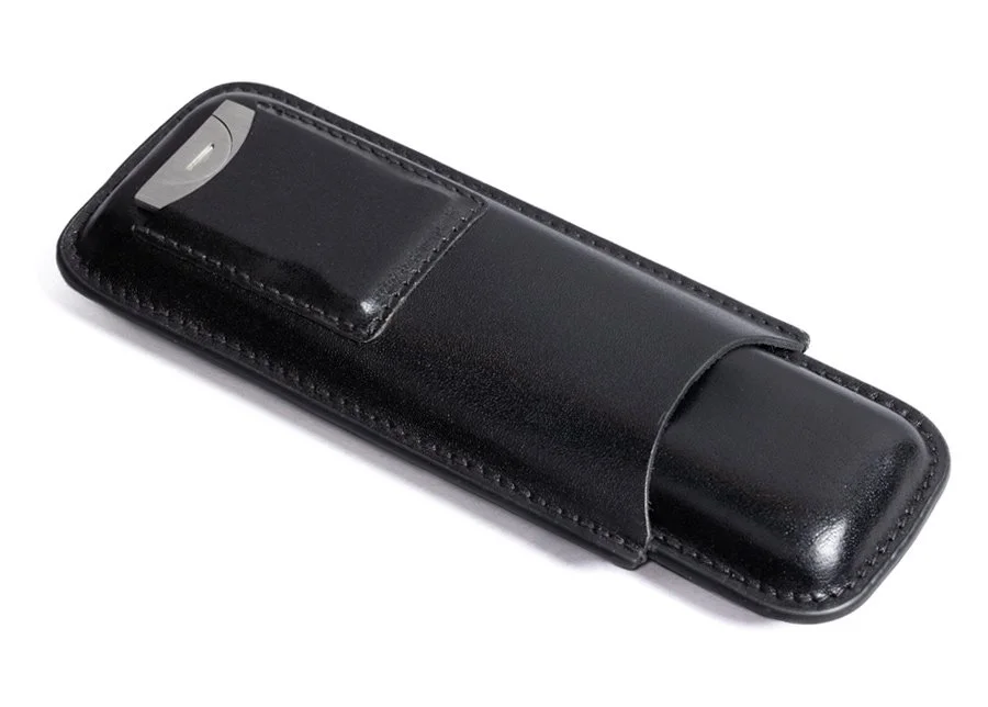 LEATHER CASE WITH CUTTER — $29.99
Black leather travel case with a built-in guillotine cutter. Holds two cigars.