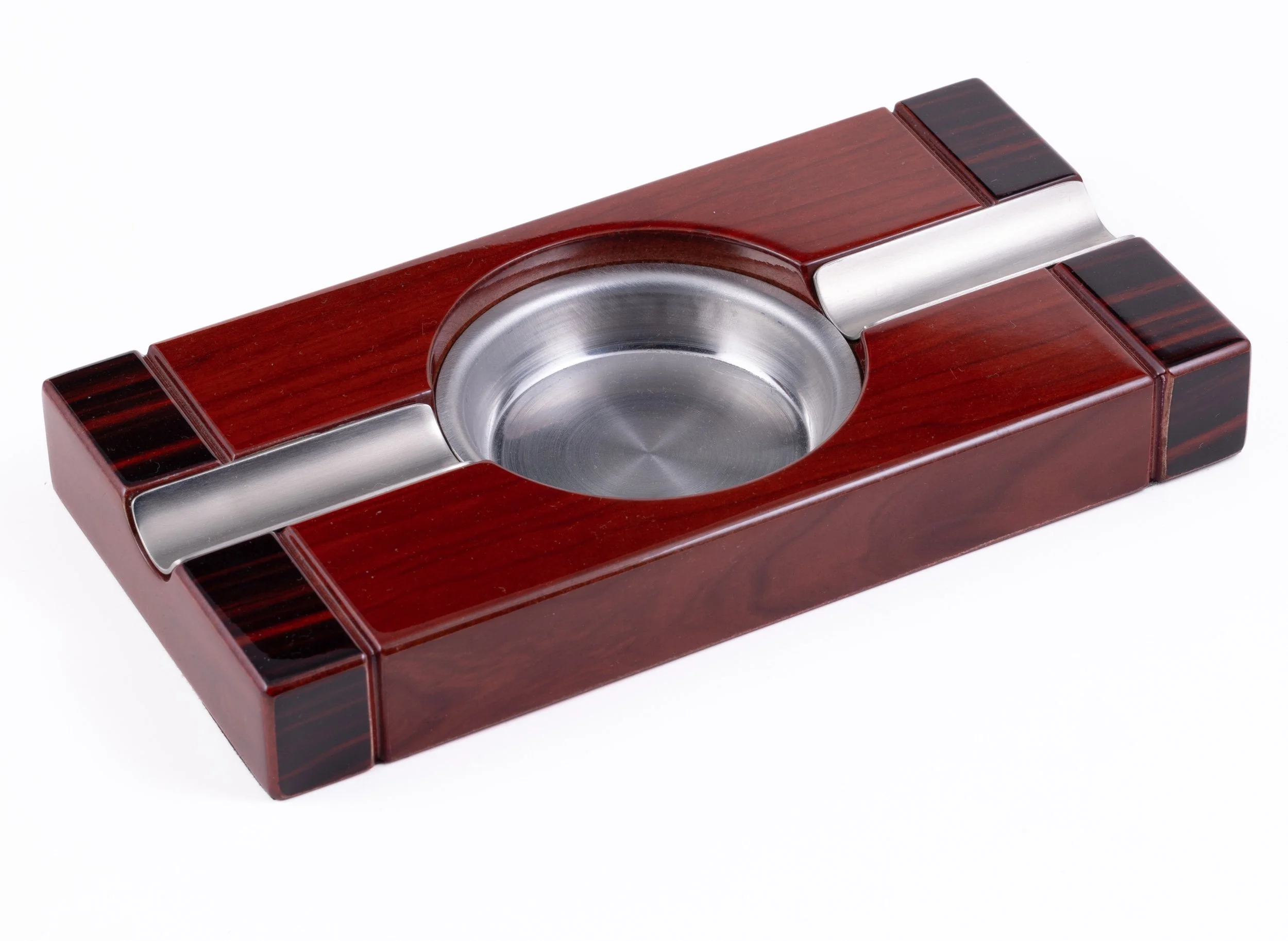 TWO-TONE CHERRY ASHTRAY — $39.99
Polished two-tone wooden ashtray with stainless-steel cigar beds.