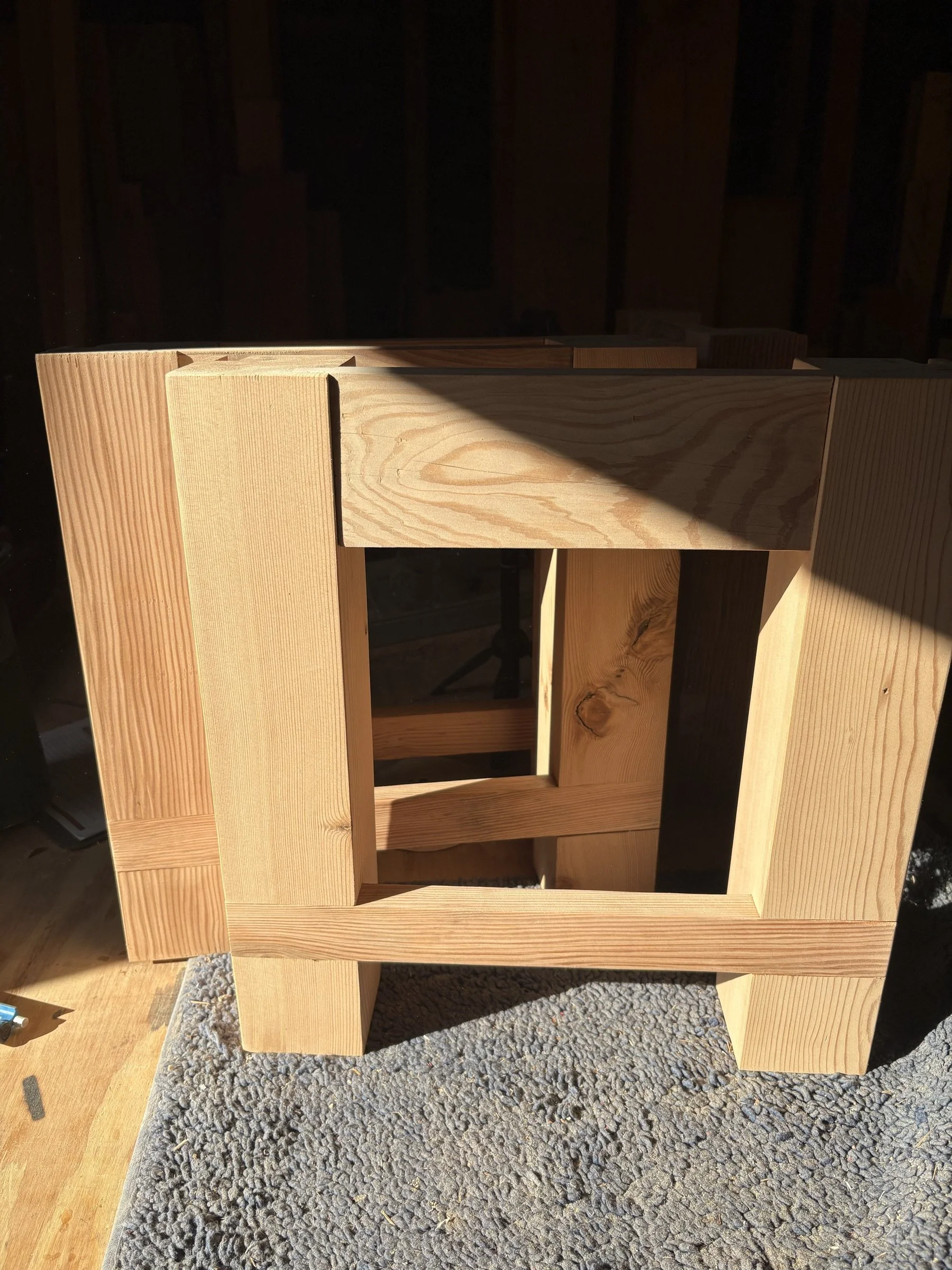 Leg-and-frame joinery of the breakfast nook bench during the build.
