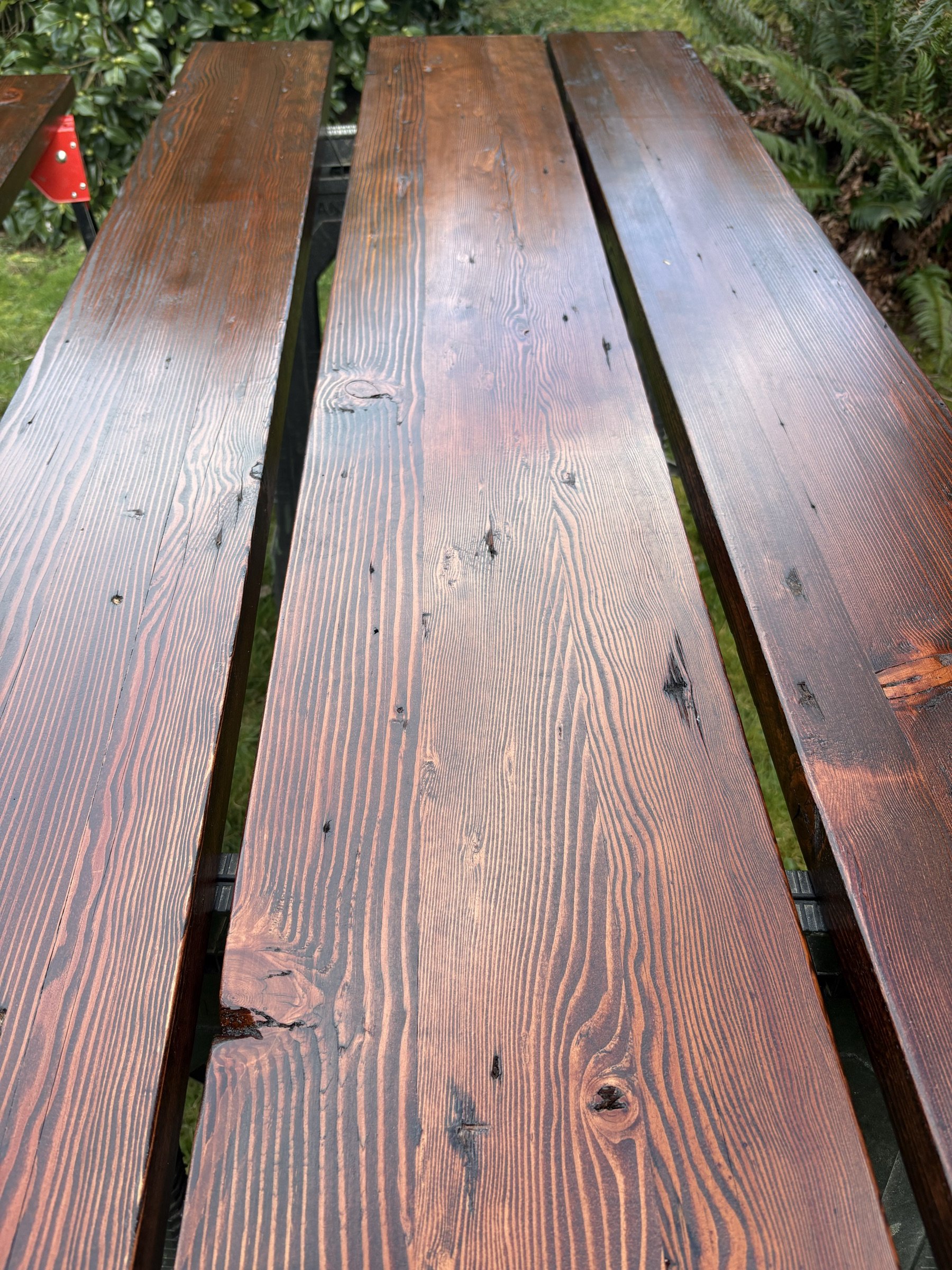 Close-up of the reclaimed old-growth fir grain on the dining table top.
