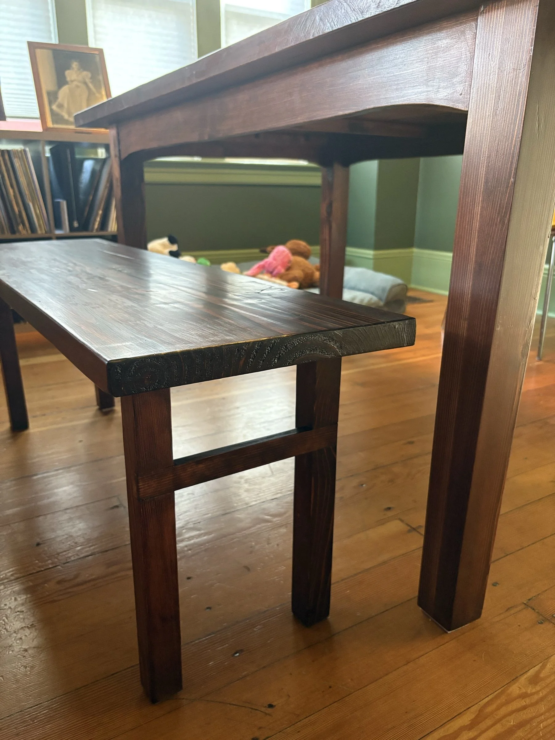 End detail of the matching bench showing the cross-lap joinery.