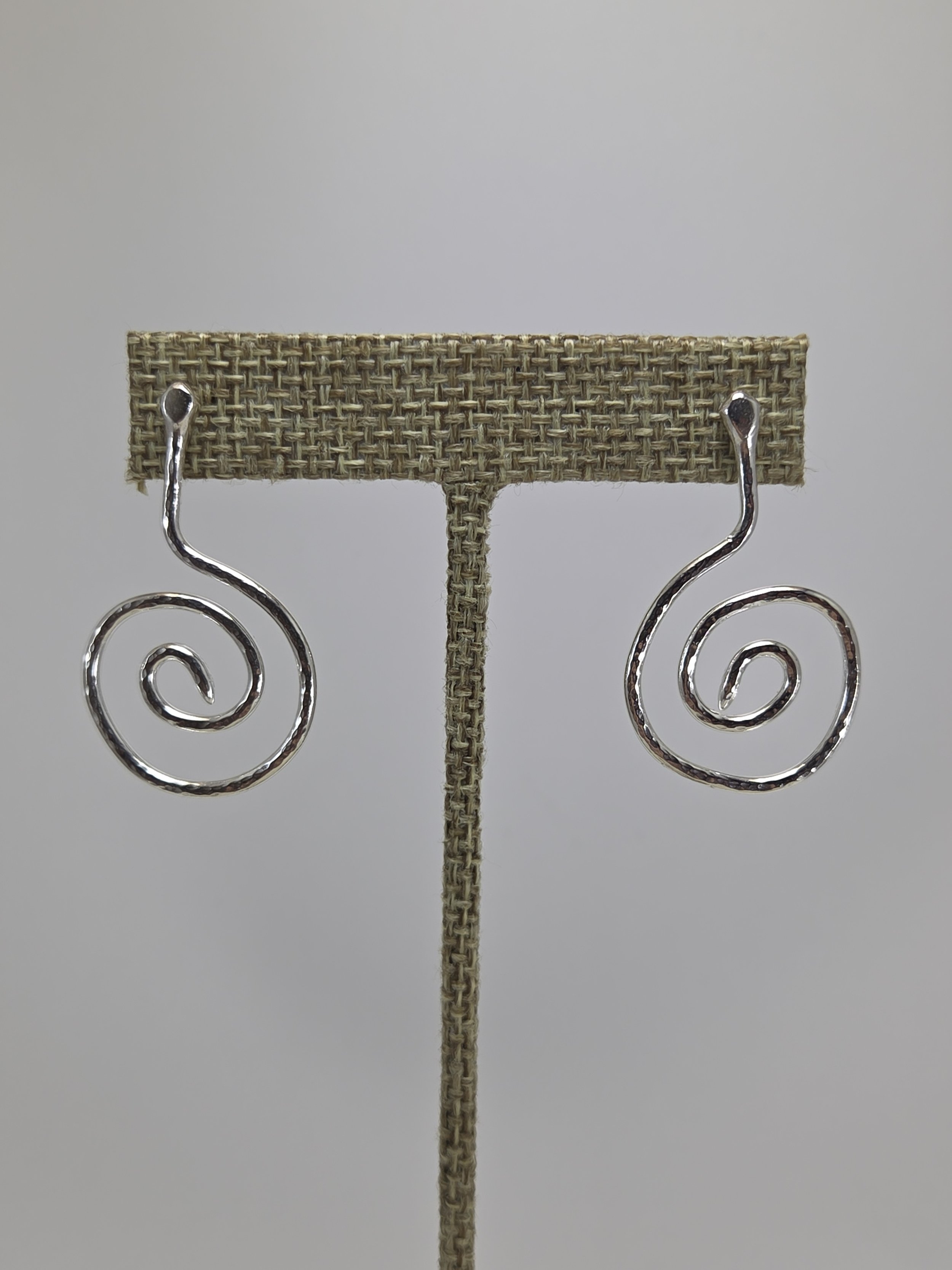Sterling silver snake shaped hammered earrings