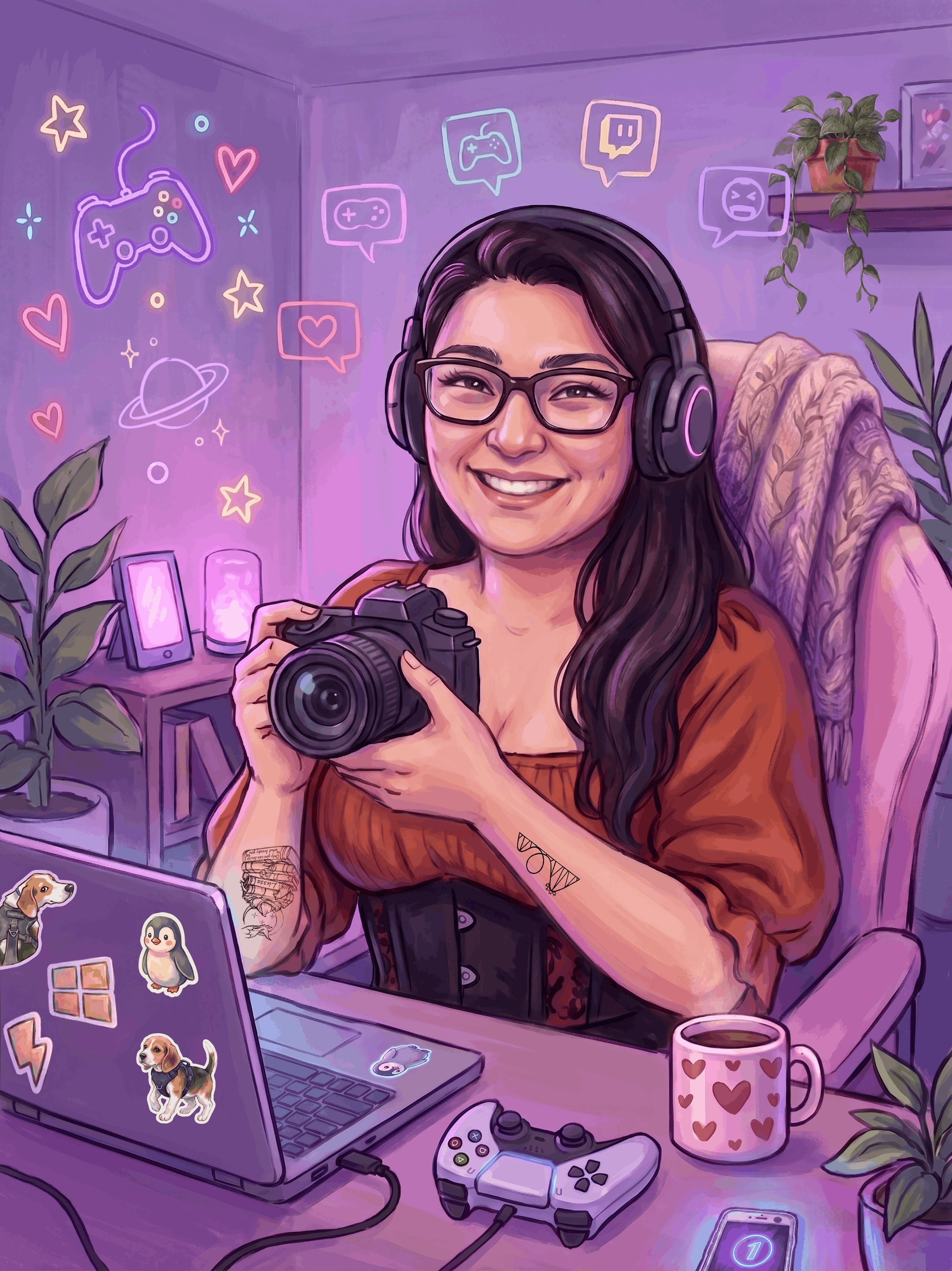 A woman with glasses and long dark hair is smiling while holding a camera in a gaming or streaming setup. She is wearing headphones and sitting at a desk with a laptop, decorated with stickers including a dog, penguin, and others. The background contains purple walls with neon images of a game controller, chat bubbles, love hearts, stars, a planet, and gaming icons. Various plants, a coffee mug with hearts, a pet, a phone with a timer, and gaming controllers are on the desk.