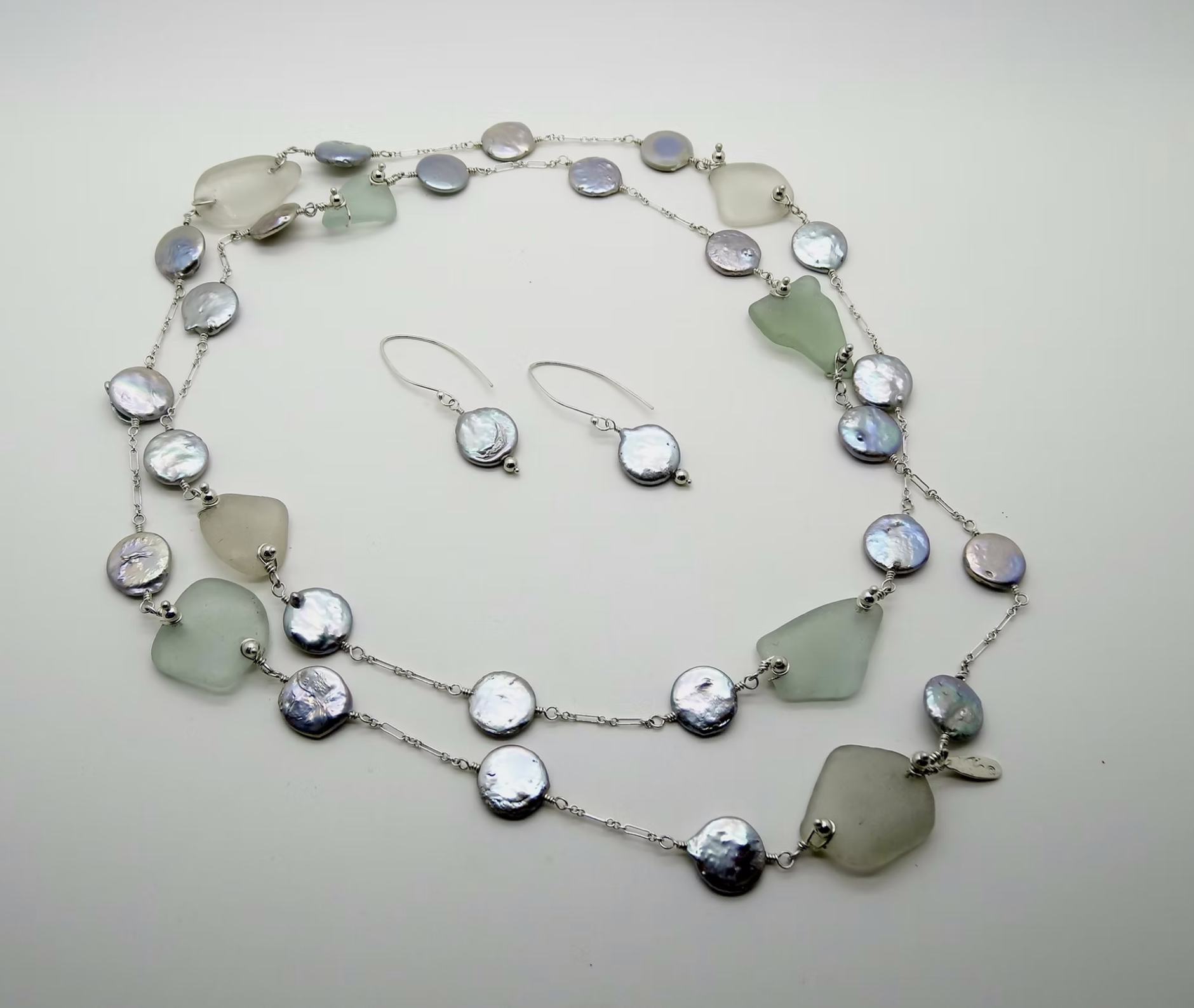 The Tides of Time Necklace & Earrings