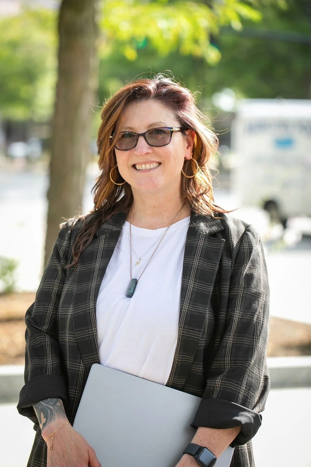 Beth McHale owner of Battenkill Marketing with her laptop