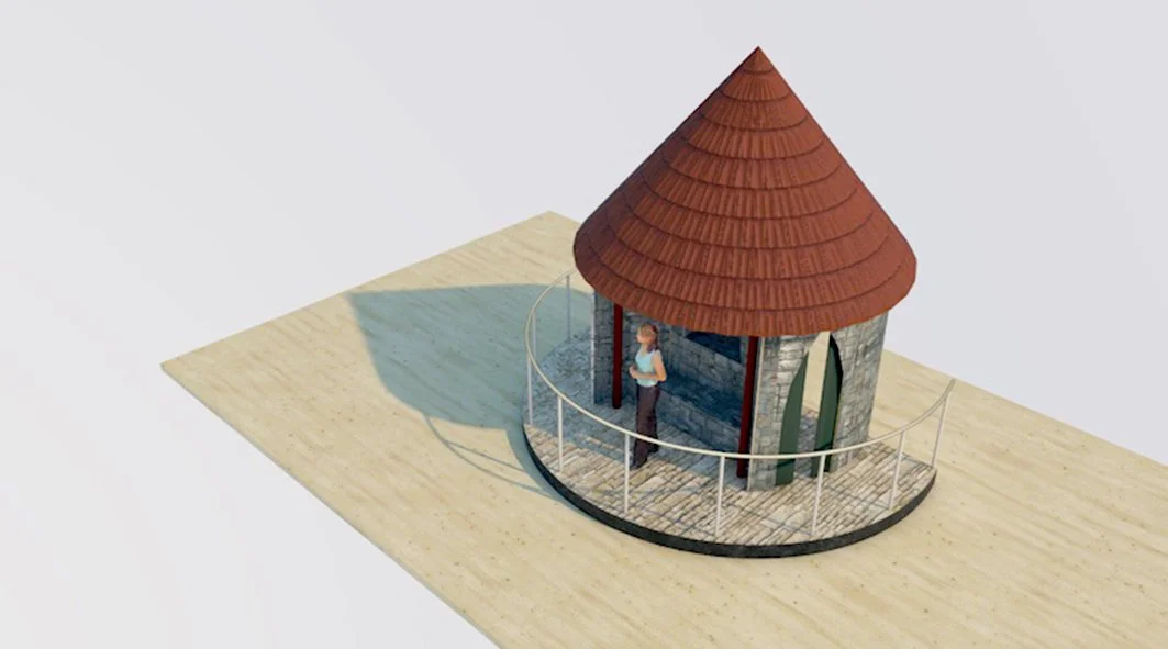 A small circular structure with a conical red shingled roof, stone walls, and a balcony with a metal railing. A person is standing on the balcony, looking out, with a shadow cast on a wooden surface beneath.