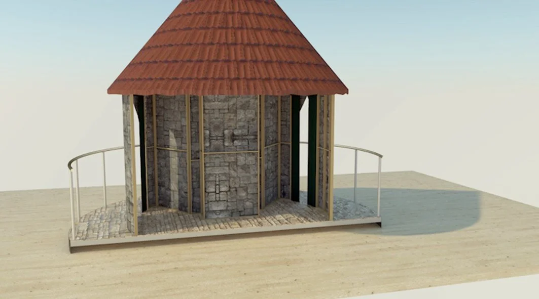 A small gazebo with a red-tiled roof, stone walls, and a wooden railing on a wooden platform.