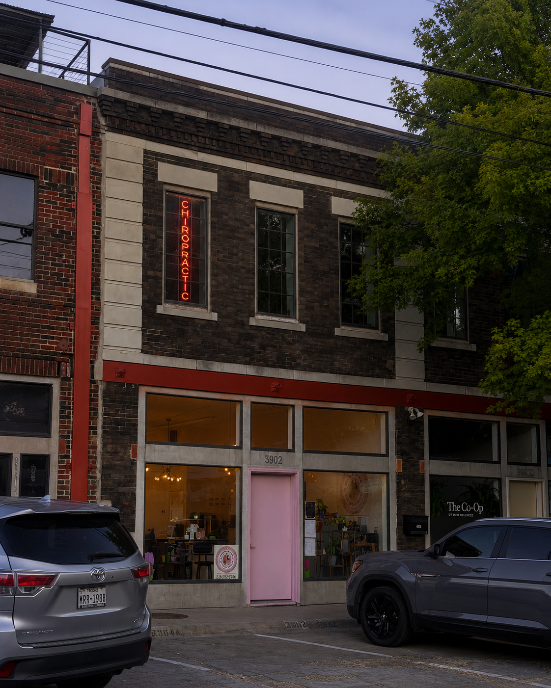 Exterior of McCue Chiropractic in Dallas, TX, a chiropractic clinic offering human and animal chiropractic care, including family chiropractic, dog chiropractic, and cold laser therapy.